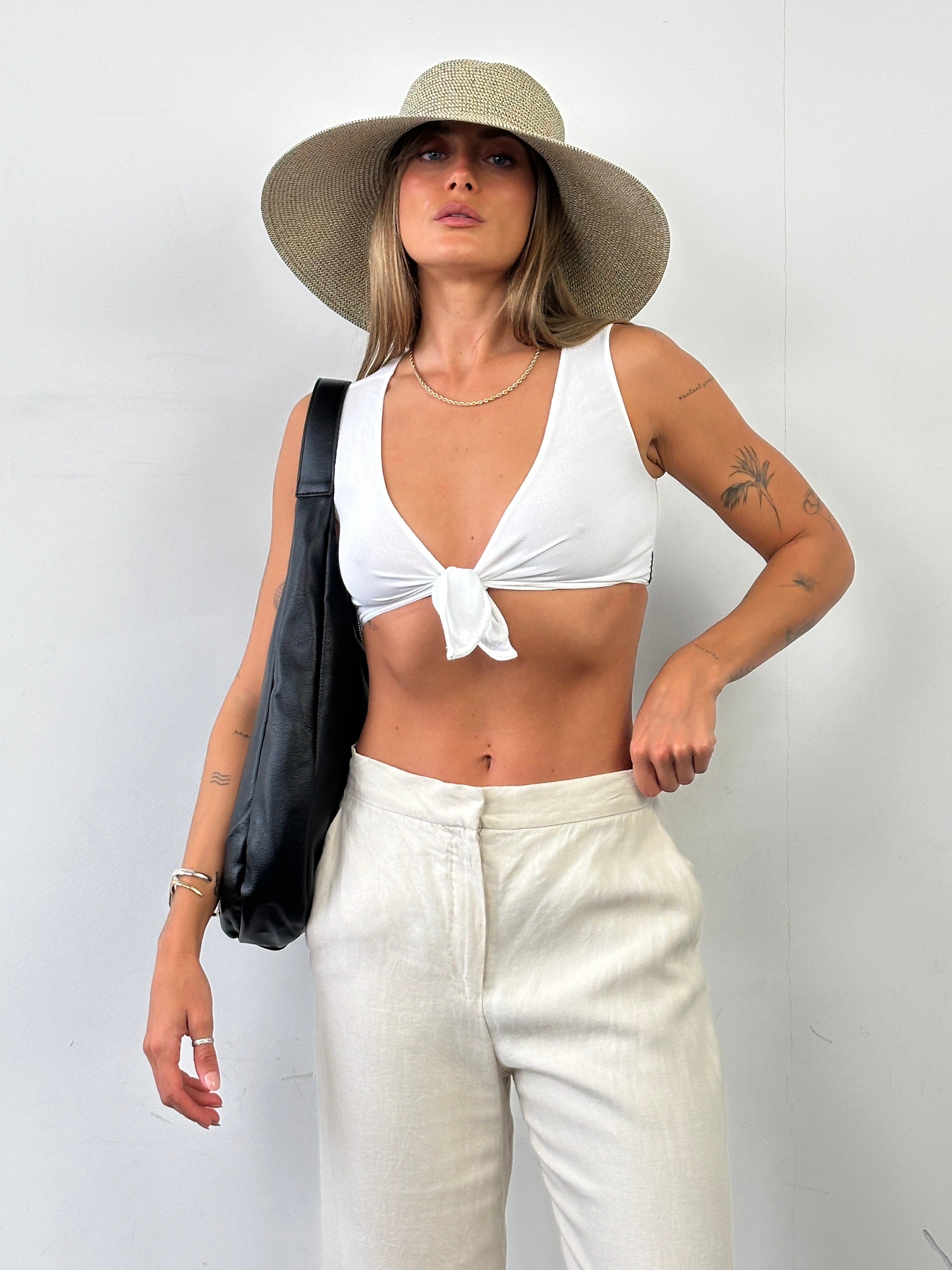 Armani Jeans cotton crop top with tie front, fitted style, in XS/S size, shown in a close-up image highlighting the design.