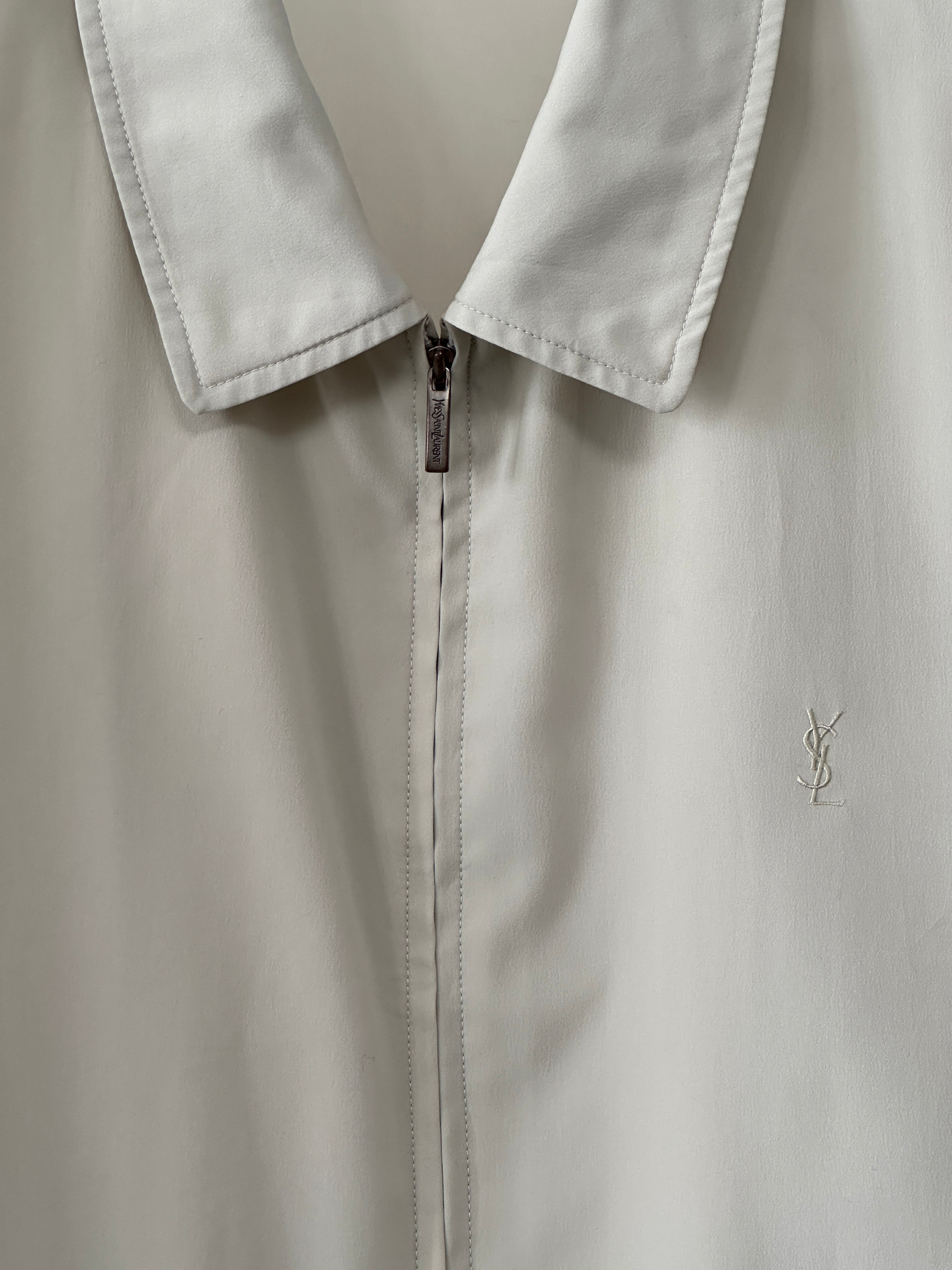 Yves Saint Laurent Pour Homme logo bomber jacket in black, with ribbed cuffs and collar, stylish men's outerwear.