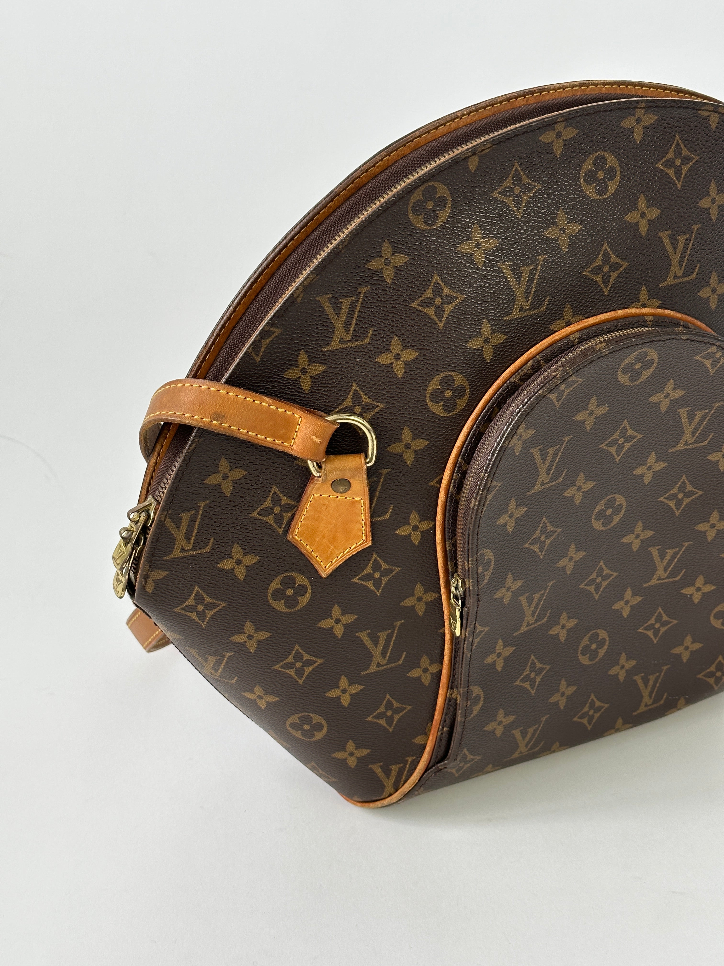 Louis Vuitton 1997 Ellipse Shoulder Bag with monogram canvas and leather trim, showing the classic bag design and adjustable shoulder strap.