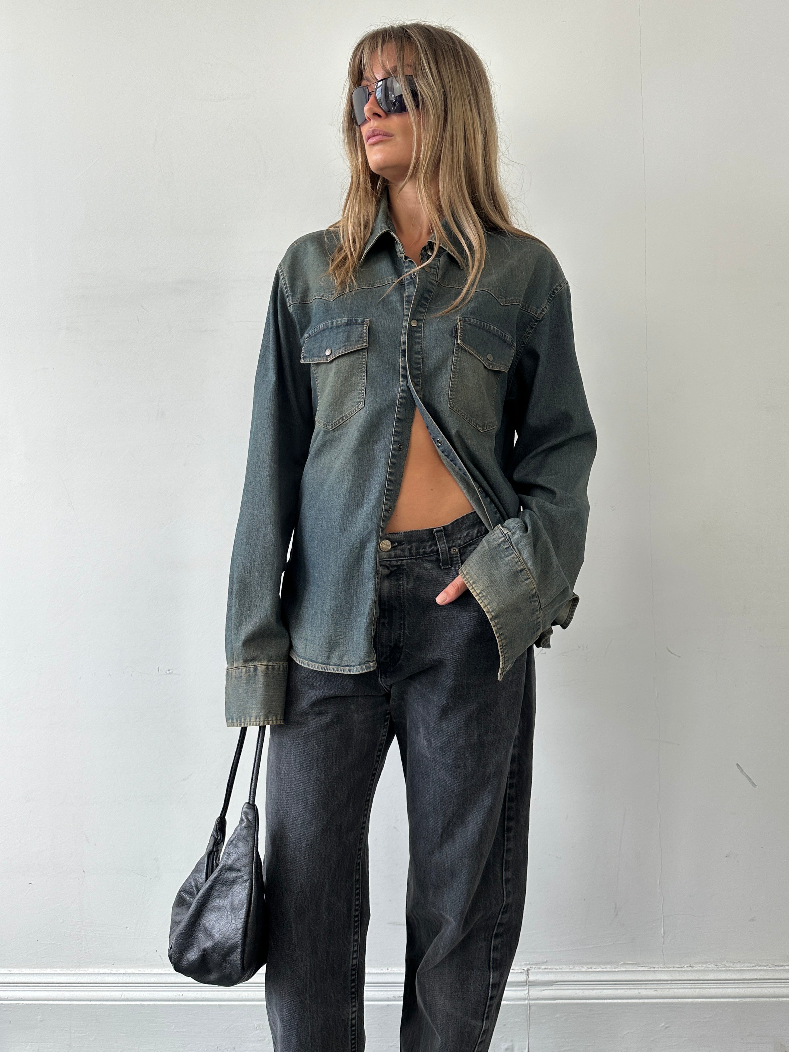 Roberto Cavalli Just Cavalli faded denim shirt in size large, featuring a casual button-up design and classic denim texture.