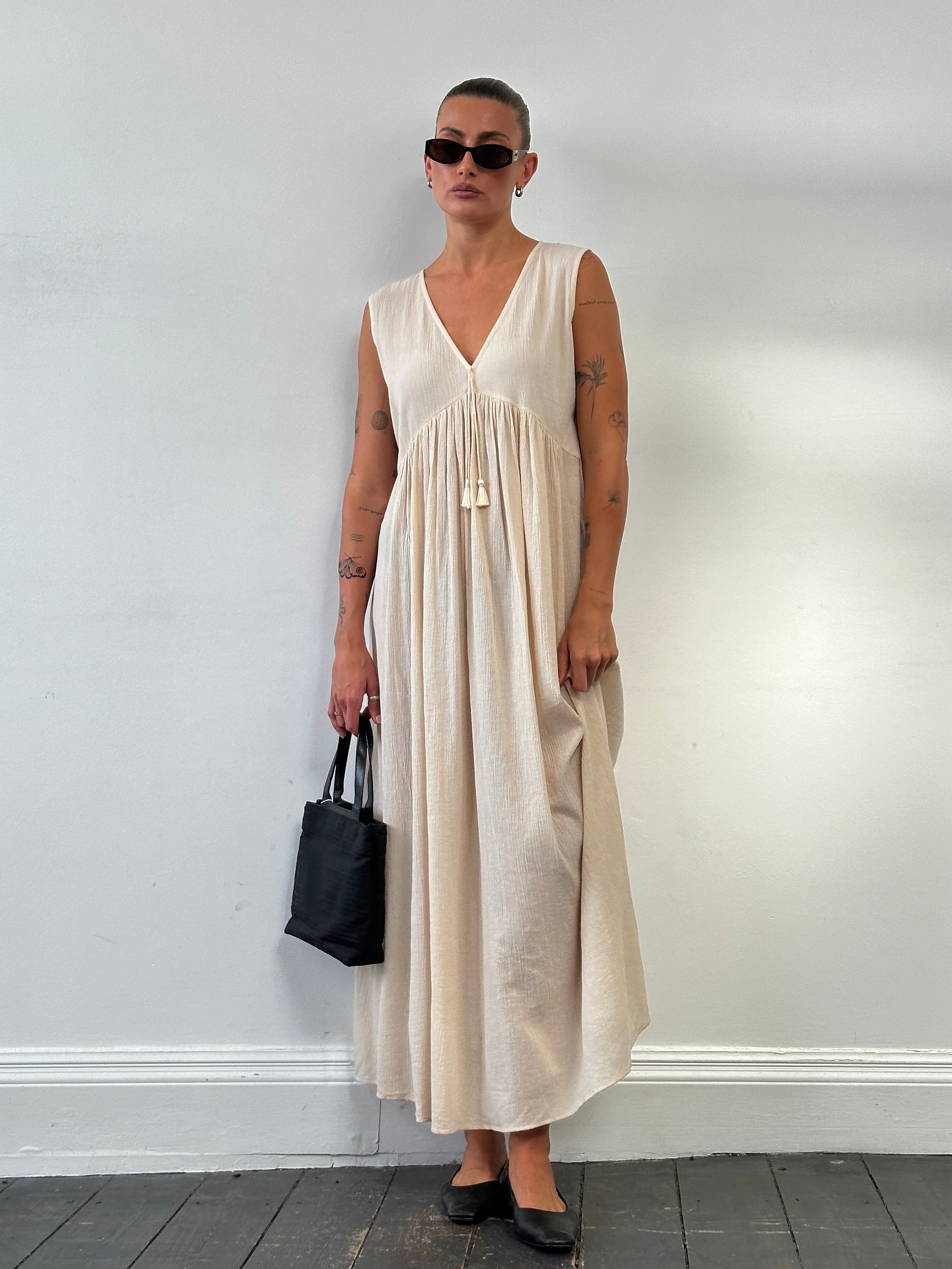 Max Mara pure cotton floor-length sun dress in UK size 12, featuring a flowing silhouette and sleeveless design.
