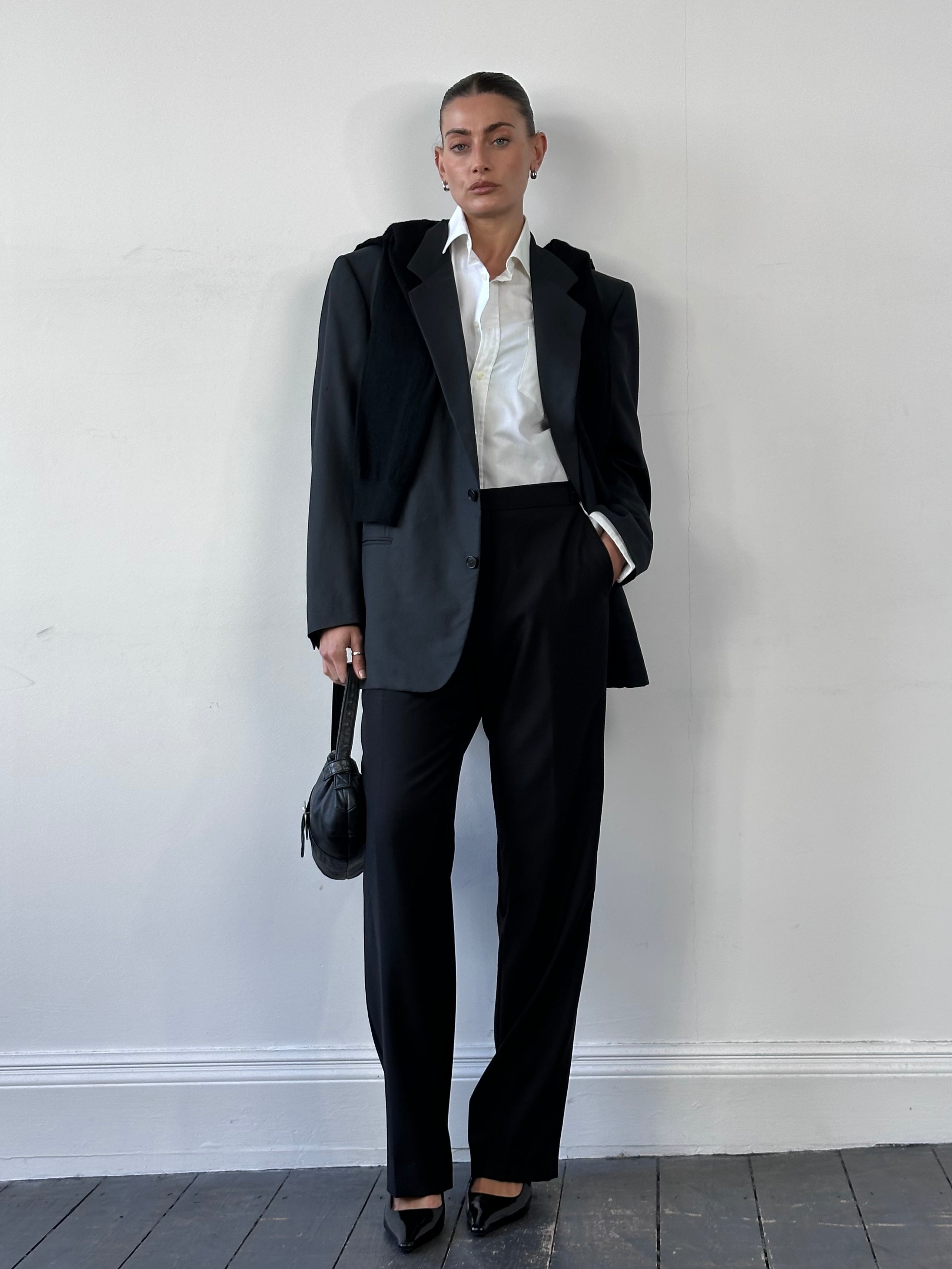Yves Saint Laurent 70s wool single-breasted blazer in size 44R/XL, shown in classic design with tailored fit and textured fabric.