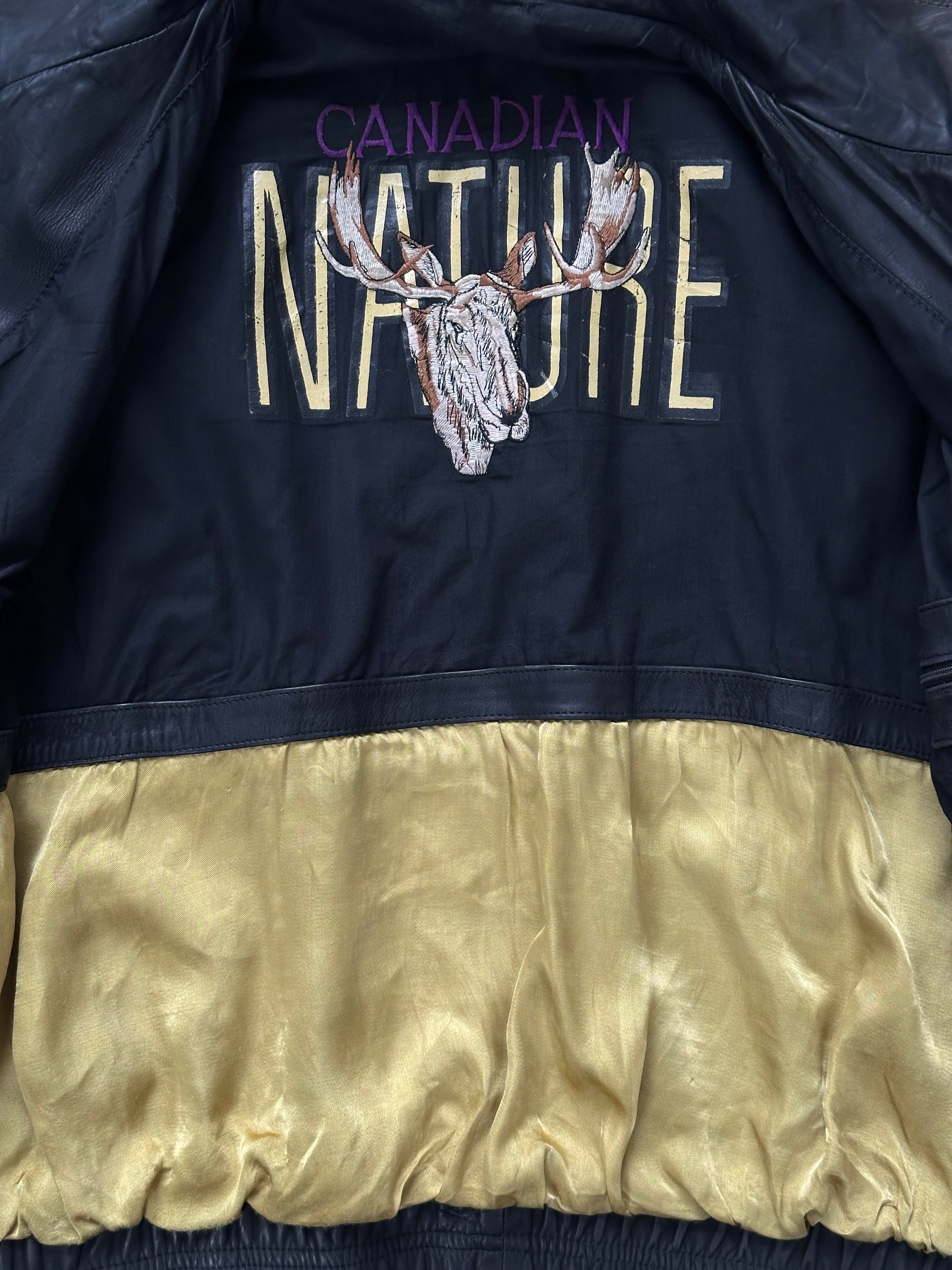 Vintage 1990s aged leather bomber jacket in XL, featuring distressed leather and classic varsity style.