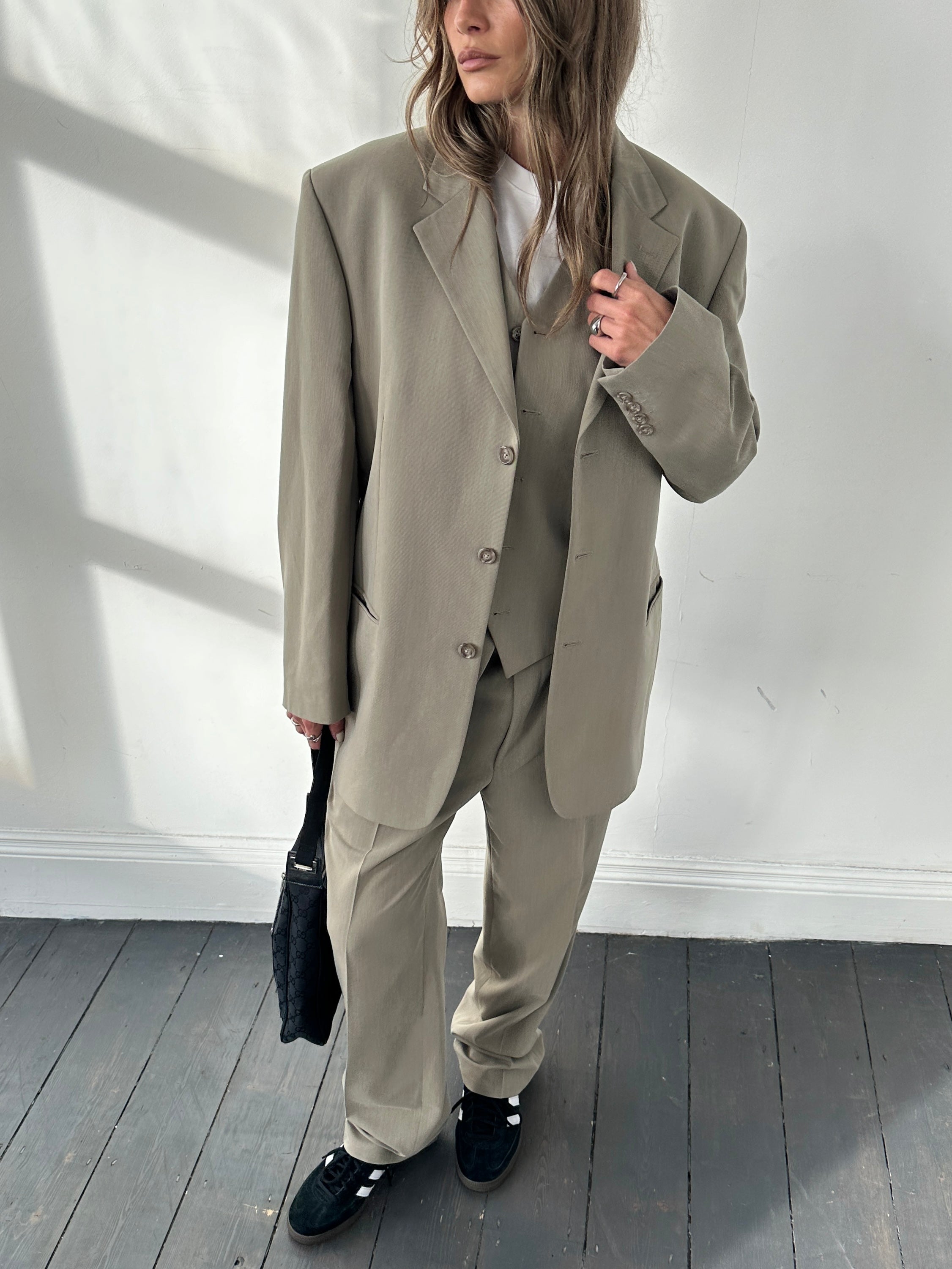 Pierre Cardin three-piece suit in size 44R/W34, featuring a tailored jacket, vest, and matching trousers for formal wear.