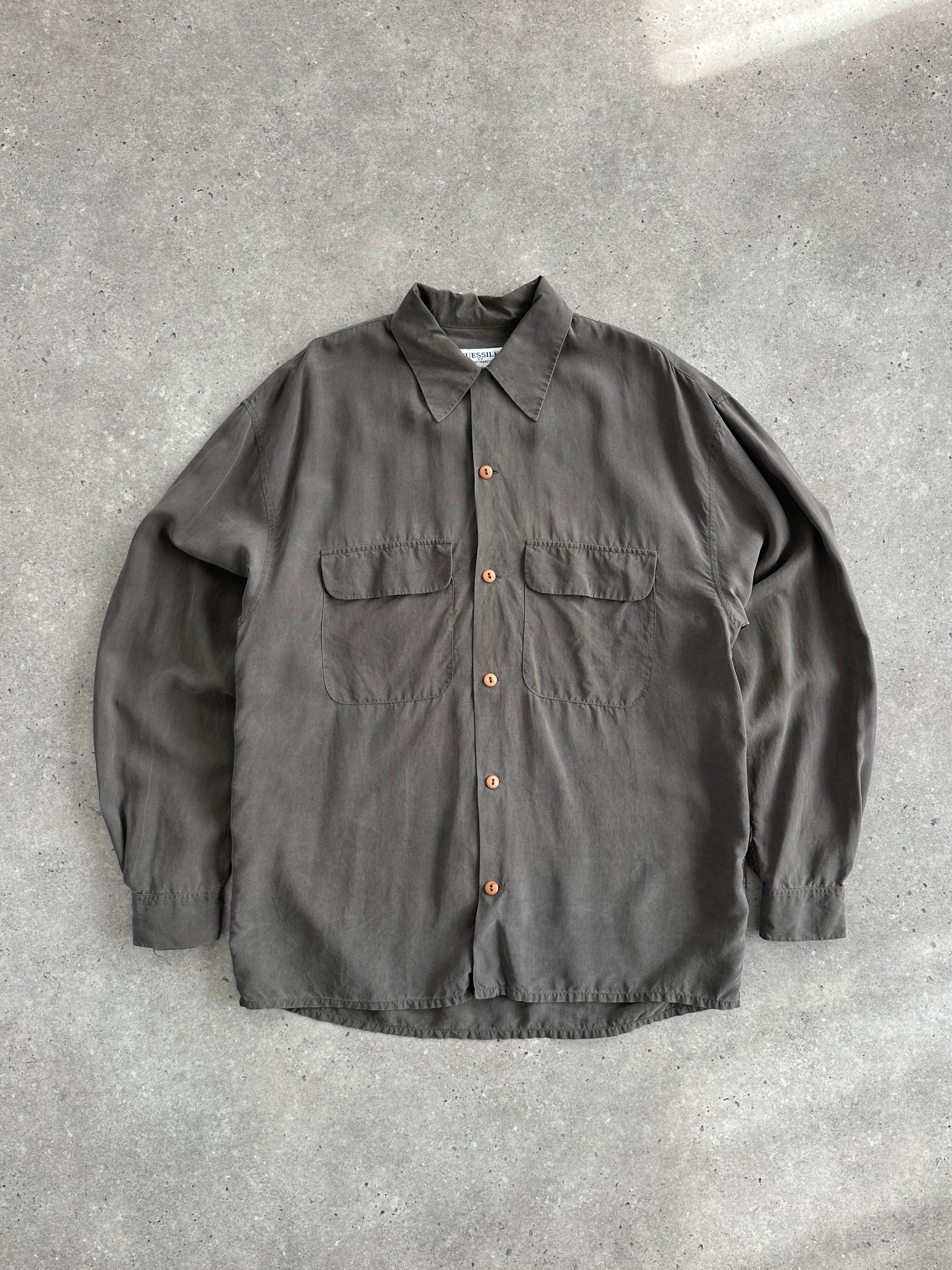 Vintage GUESSILK 1990s pure silk minimal shirt in size large, shown in a sleek, classic design with a smooth silk finish.