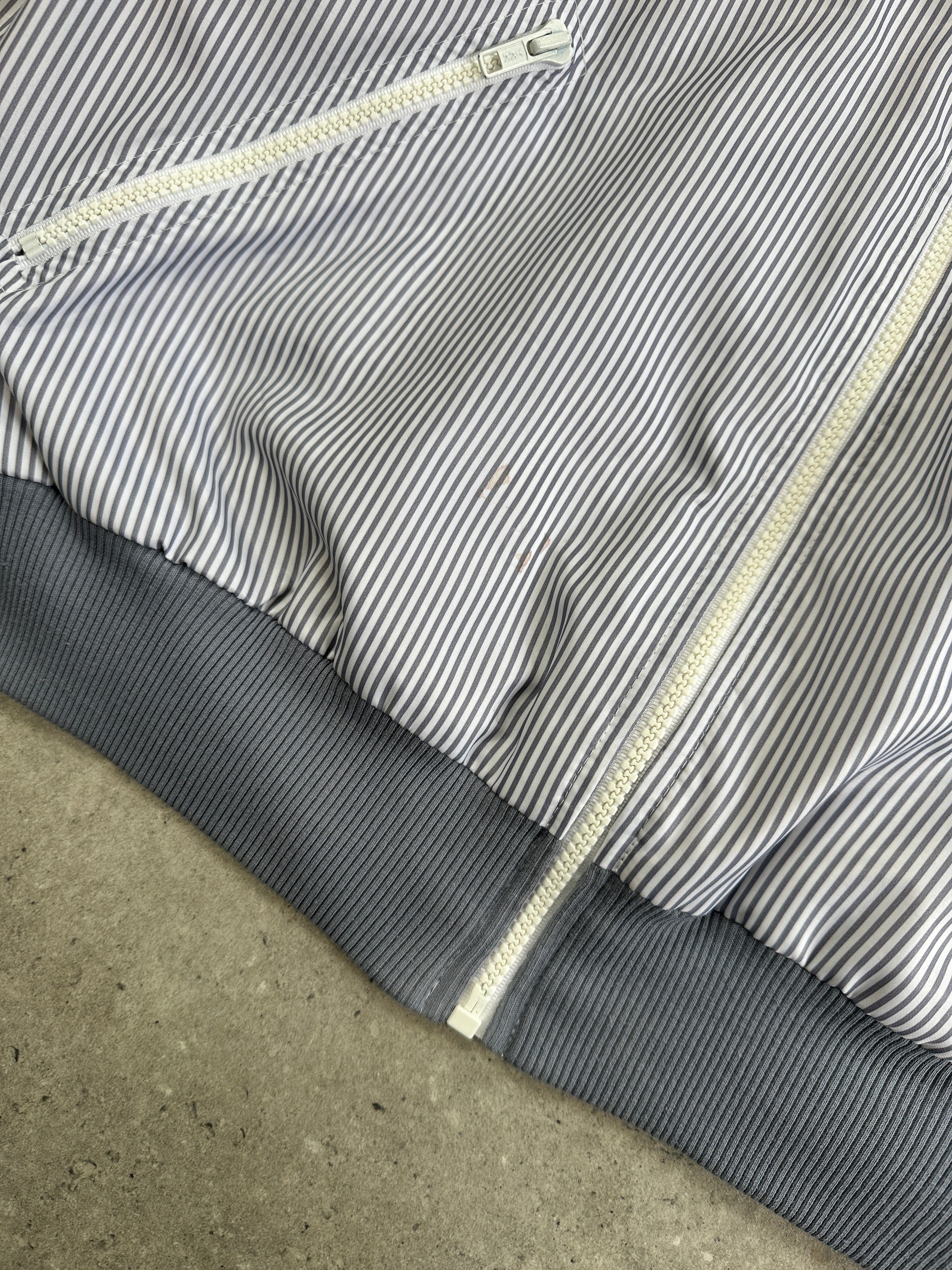 Lacoste 80s stripe tracksuit jacket in size L, featuring classic striped design and Lacoste branding, front view.
