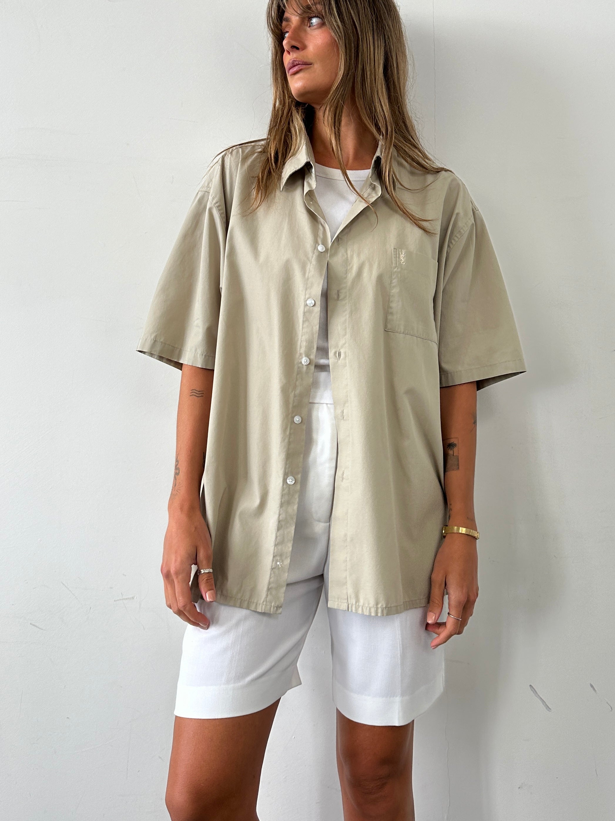 Yves Saint Laurent Pour Homme cotton short sleeve shirt in XXL with logo, white fabric, and classic collar, displayed on a hanger.