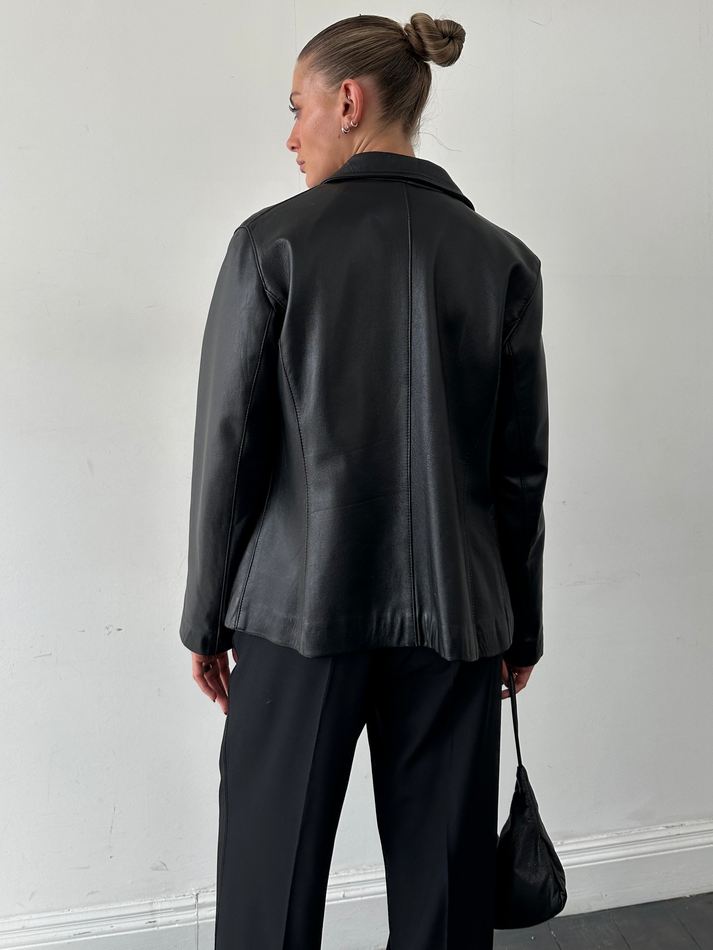 Italian vintage smooth leather double zip jacket for men, featuring a stylish design with silver zippers and a classic fit.
