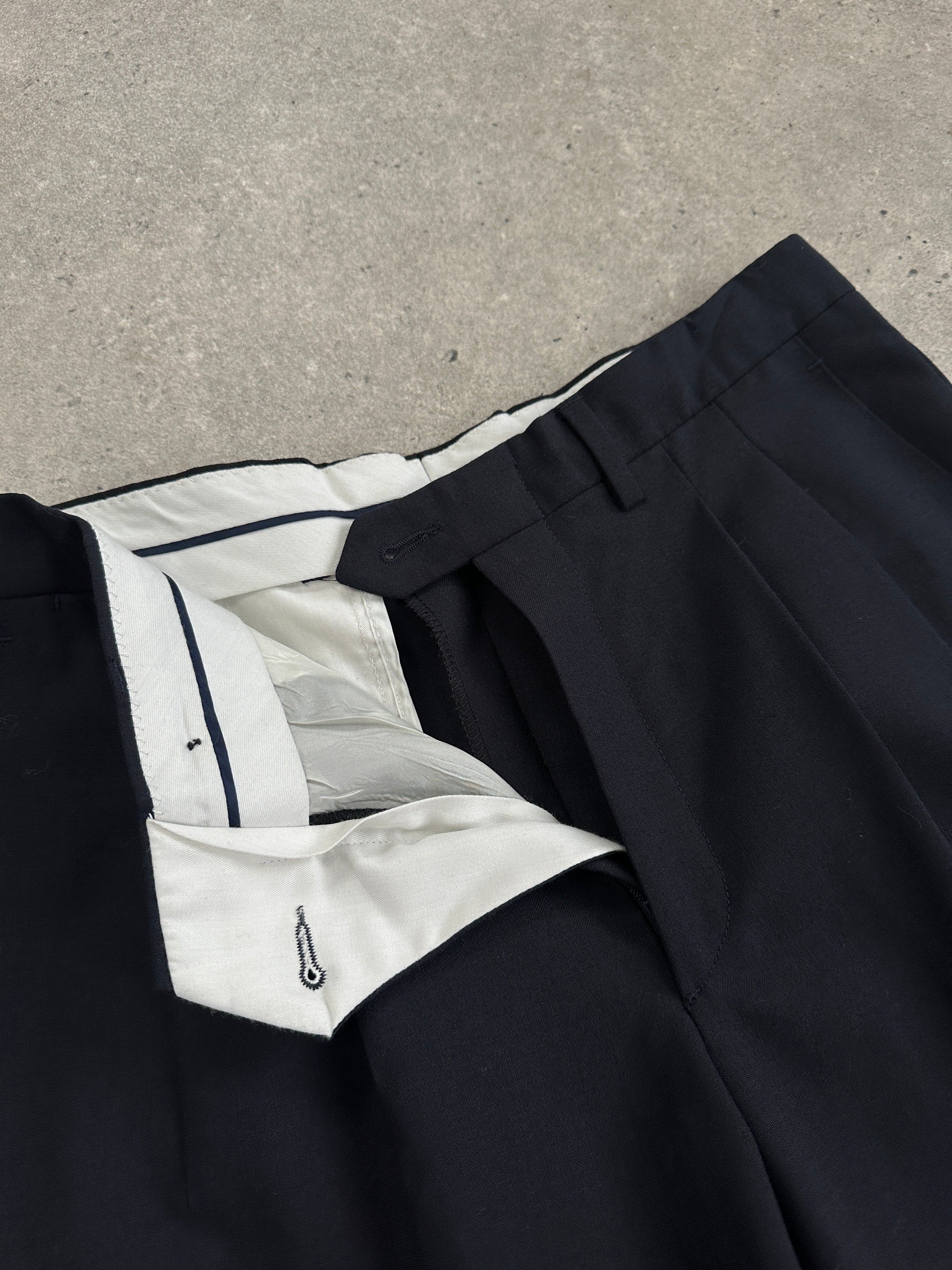 Italian Vintage wool tailored trousers in straight leg style, W28, featuring classic design and rich fabric for a sophisticated look.