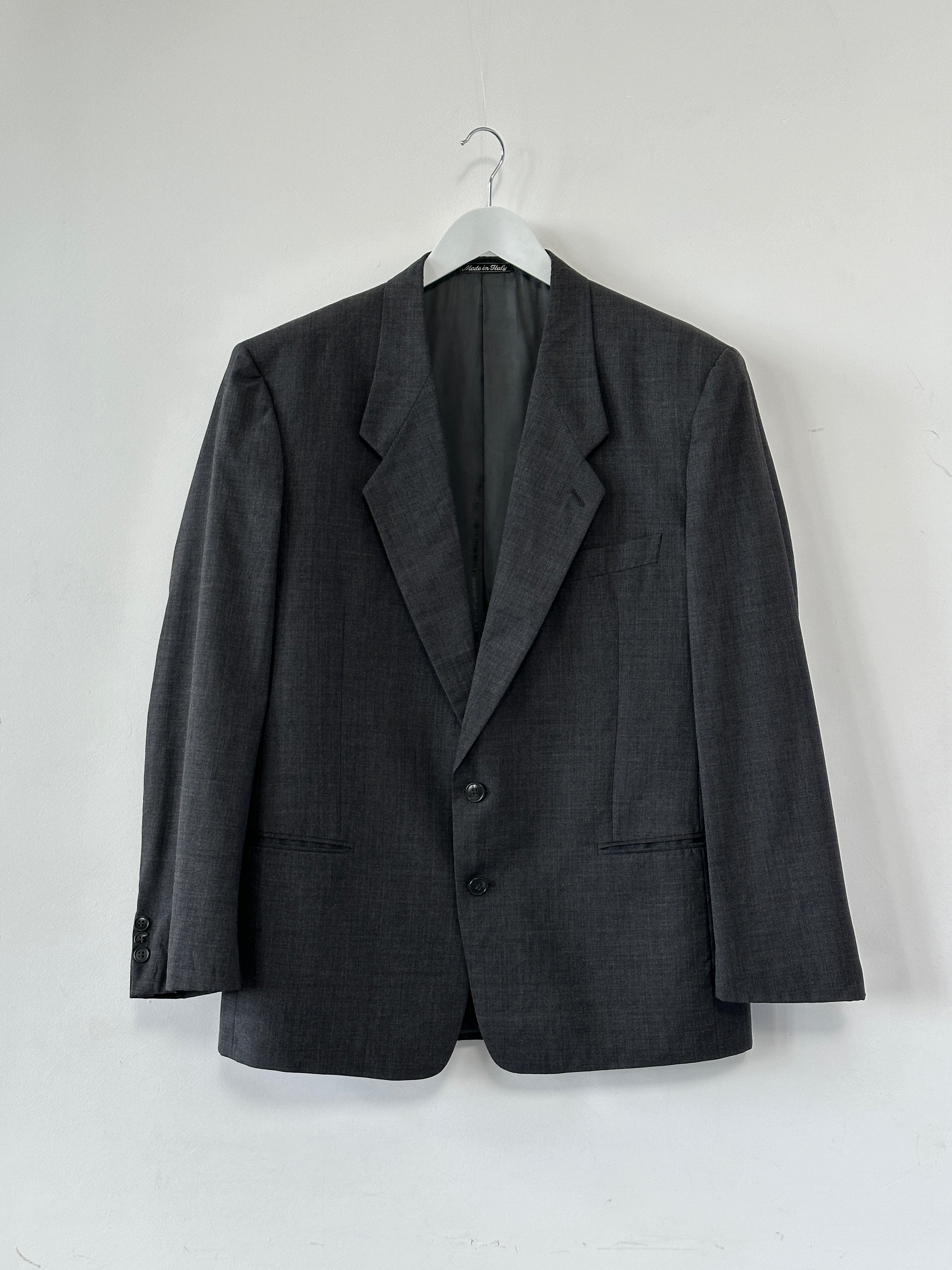 Giorgio Armani pure wool single-breasted blazer in size 42R/XL, shown in classic tailored fit with notch lapel and sleek design.