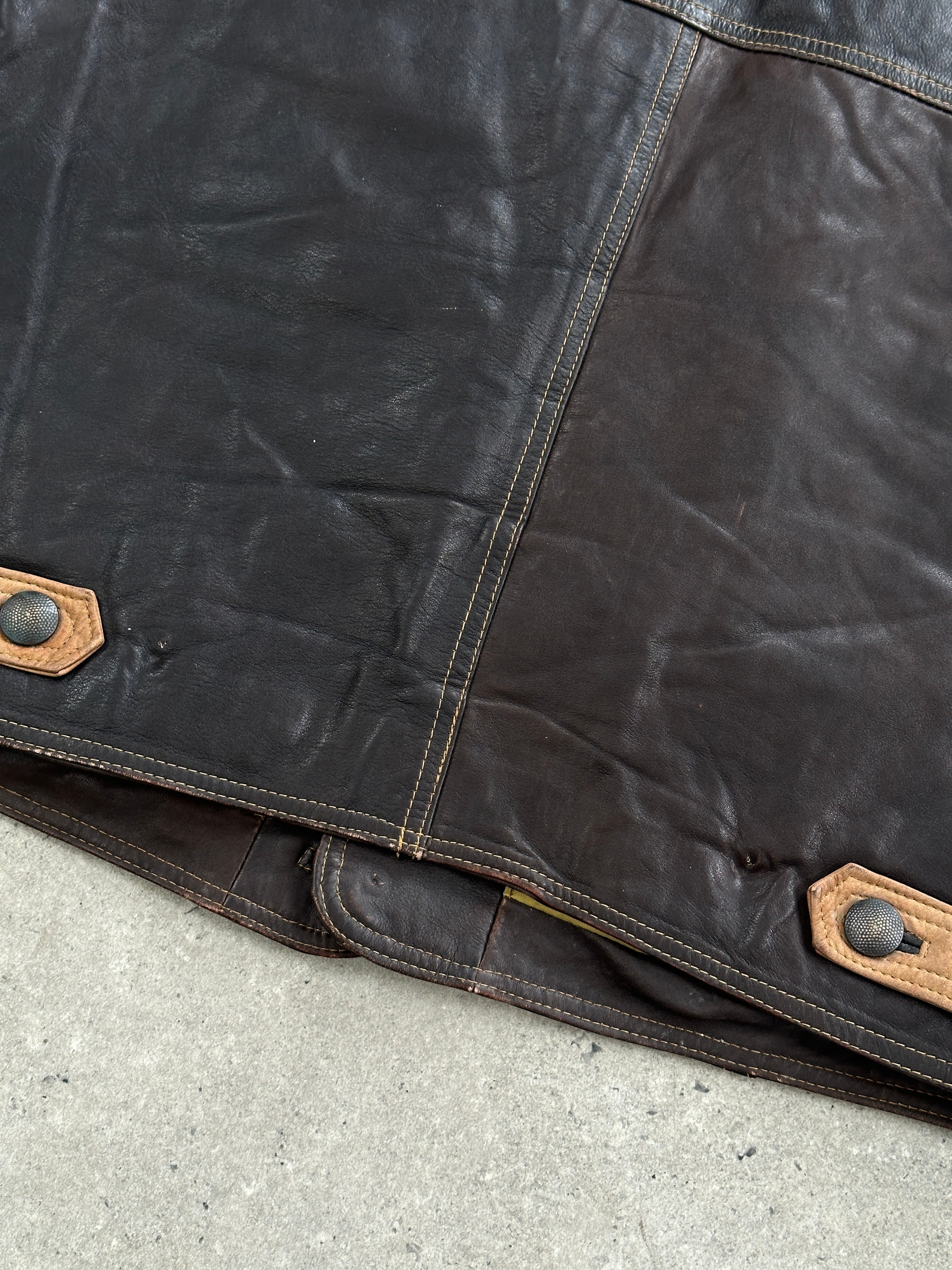 Vintage camel distressed leather waistcoat in size M, featuring a rugged, stylish design with front pockets and a classic fit.