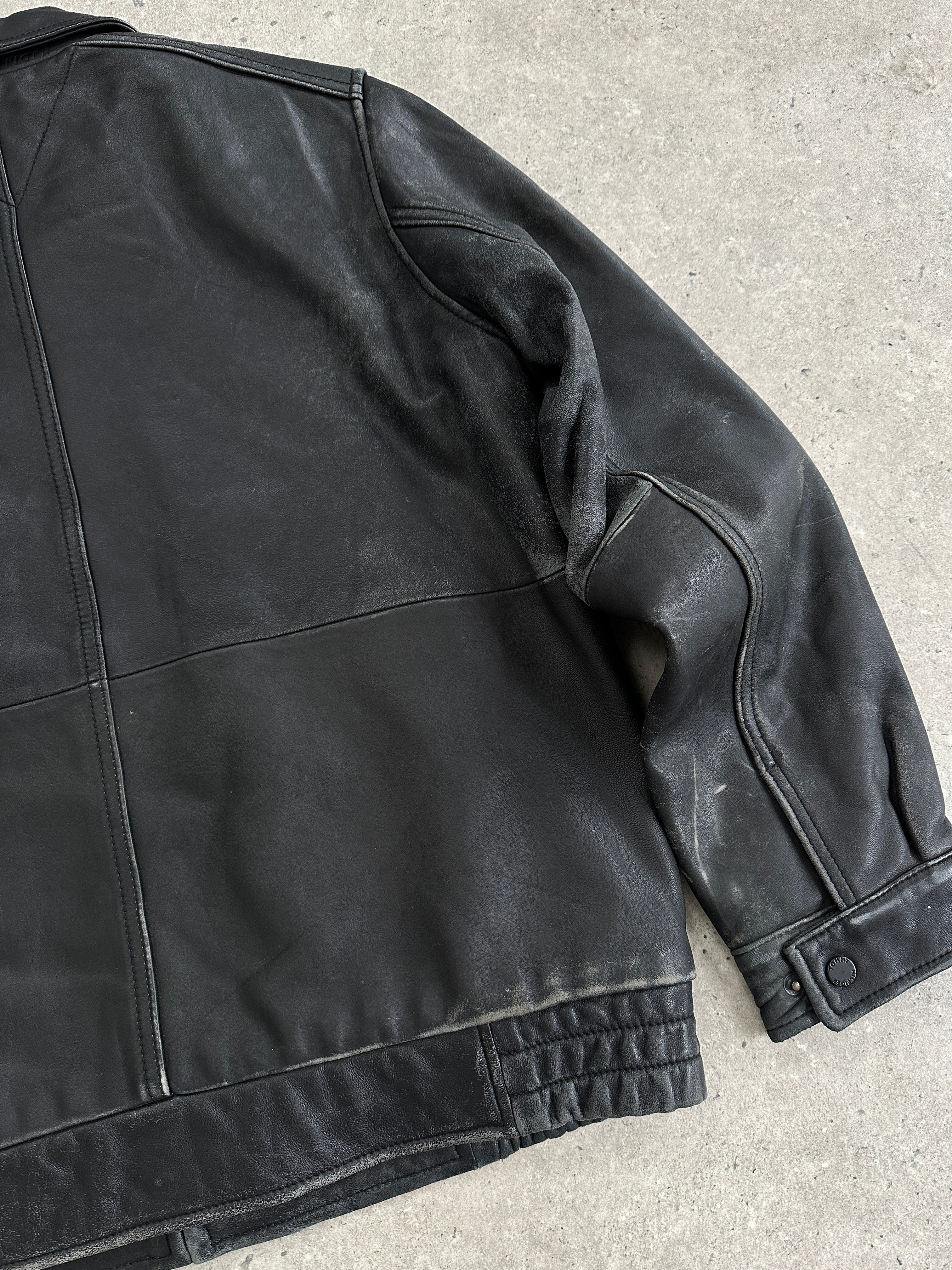 Tommy Hilfiger distressed leather bomber jacket in size M, featuring a fitted design and stylish worn-in look.