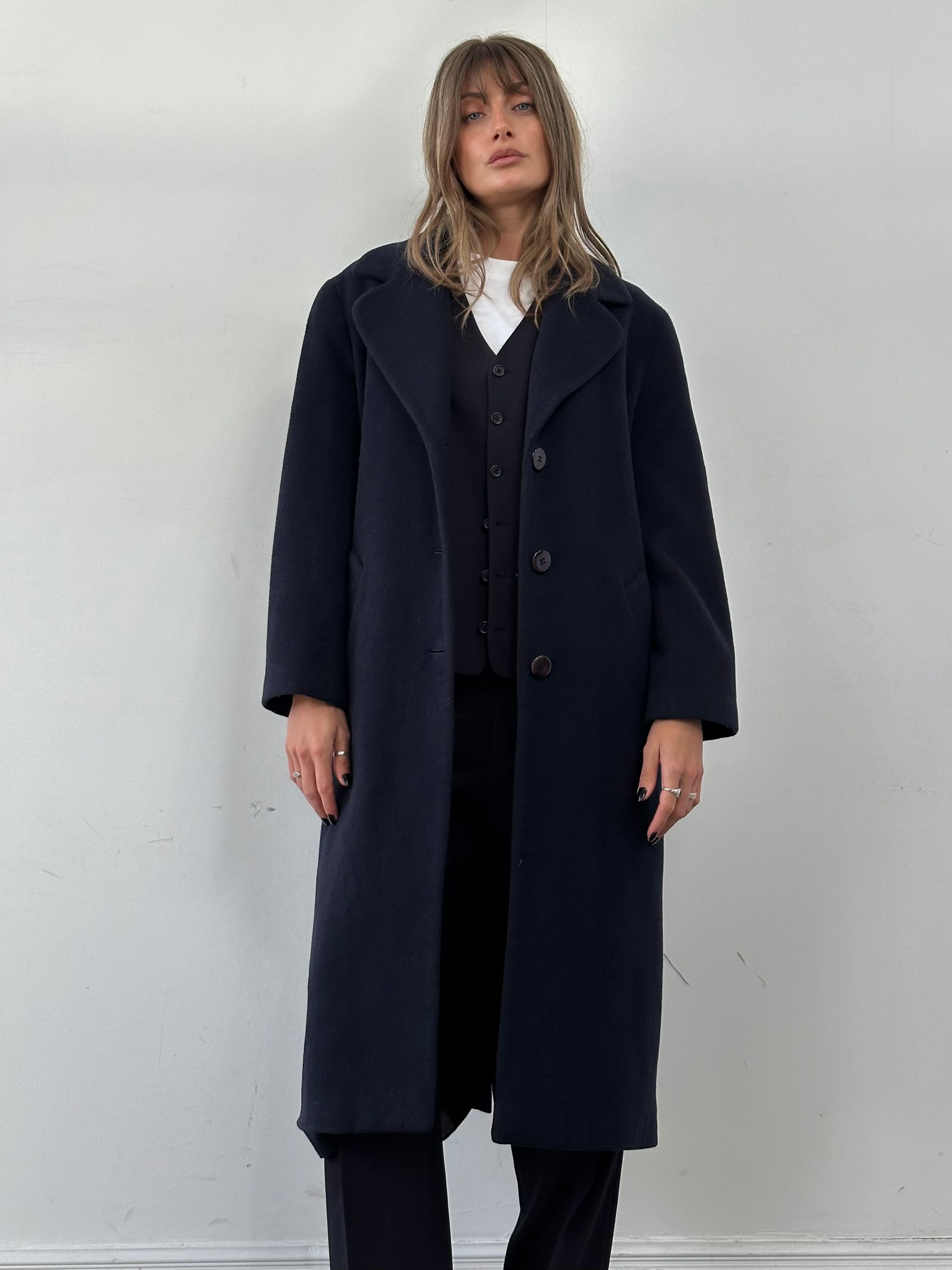 Vintage Virgin Wool Single Breasted Coat in size M, showcasing classic design with tailored lapels and button closure.