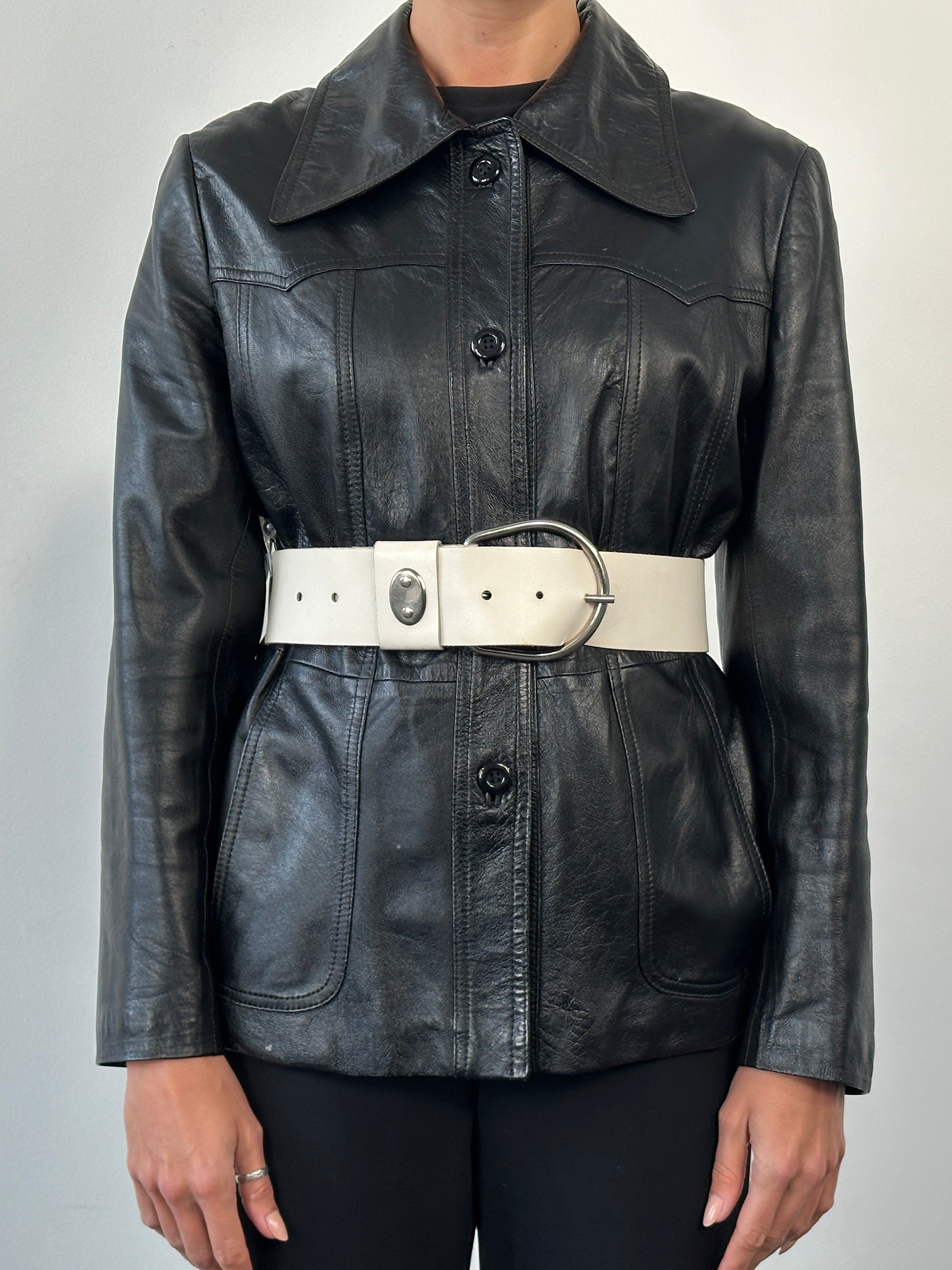 Vintage 1990s chrome chunky leather belt with adjustable W27-34, featuring a bold metal buckle and distressed leather finish.