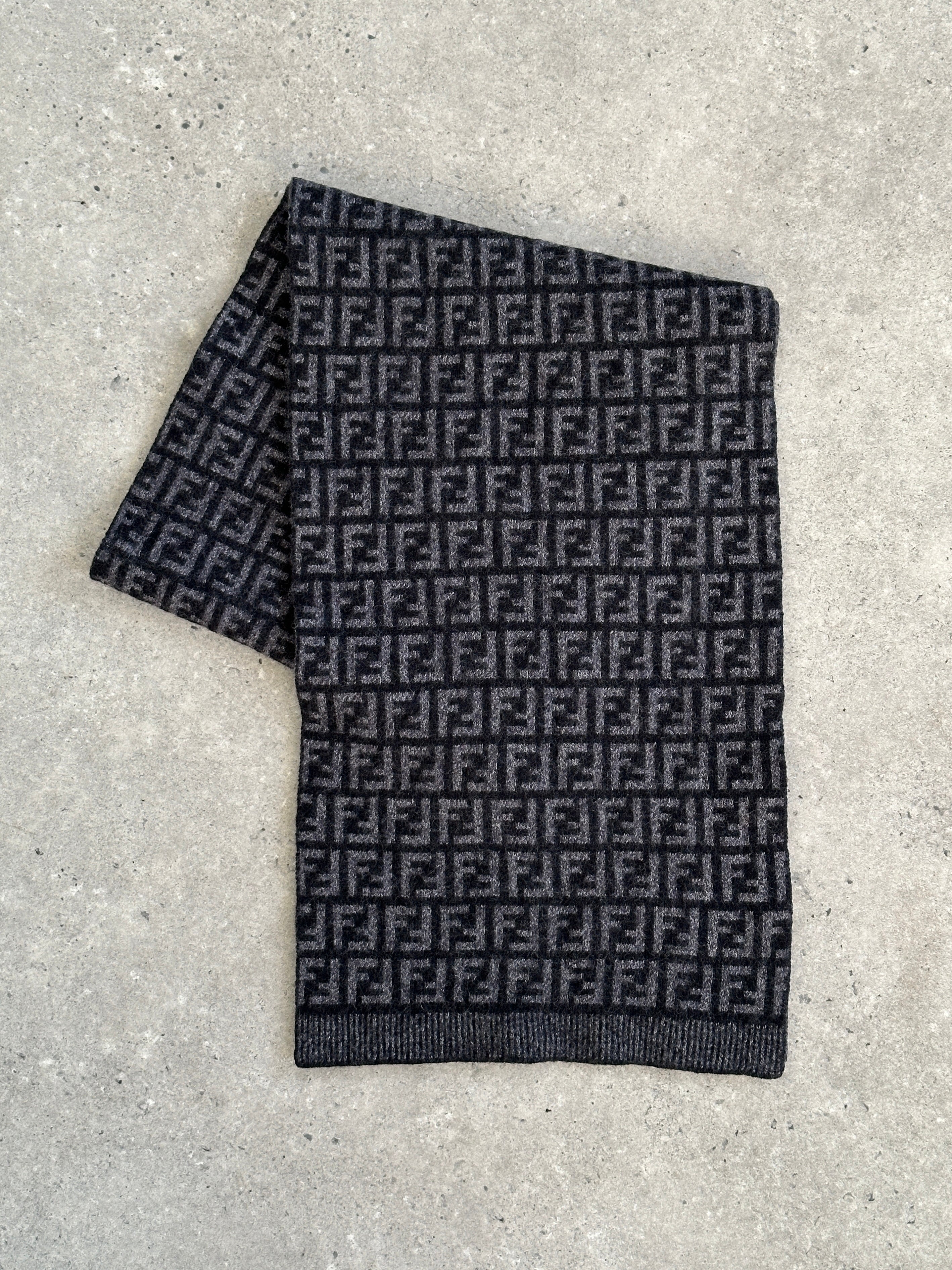 Fendi FF Monogram pure wool scarf with signature pattern, soft texture, and elegant design displayed in the image.
