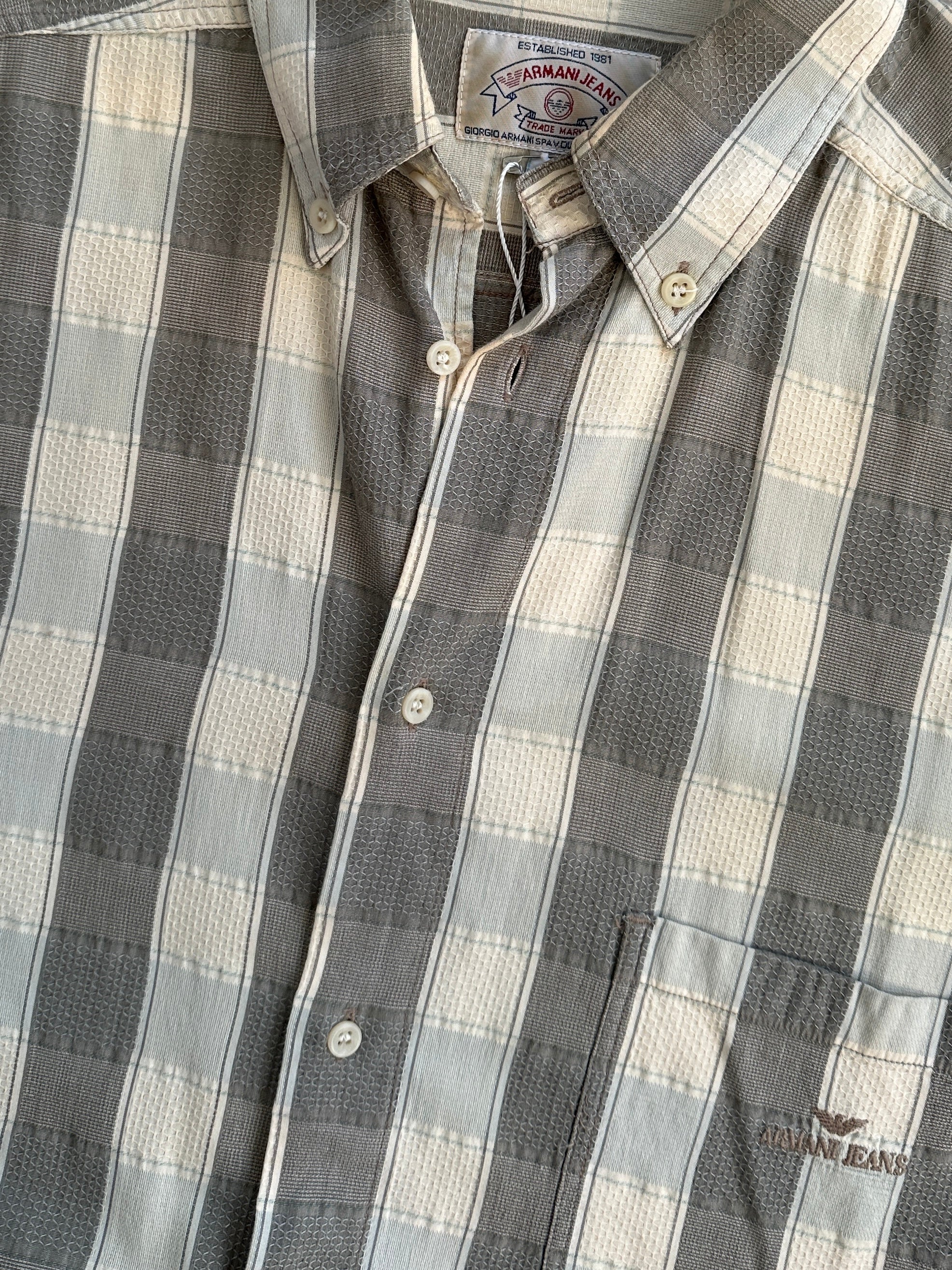 Armani Jeans 1990s check flannel logo shirt in XXL, featuring a classic plaid pattern and the Armani logo on the chest.