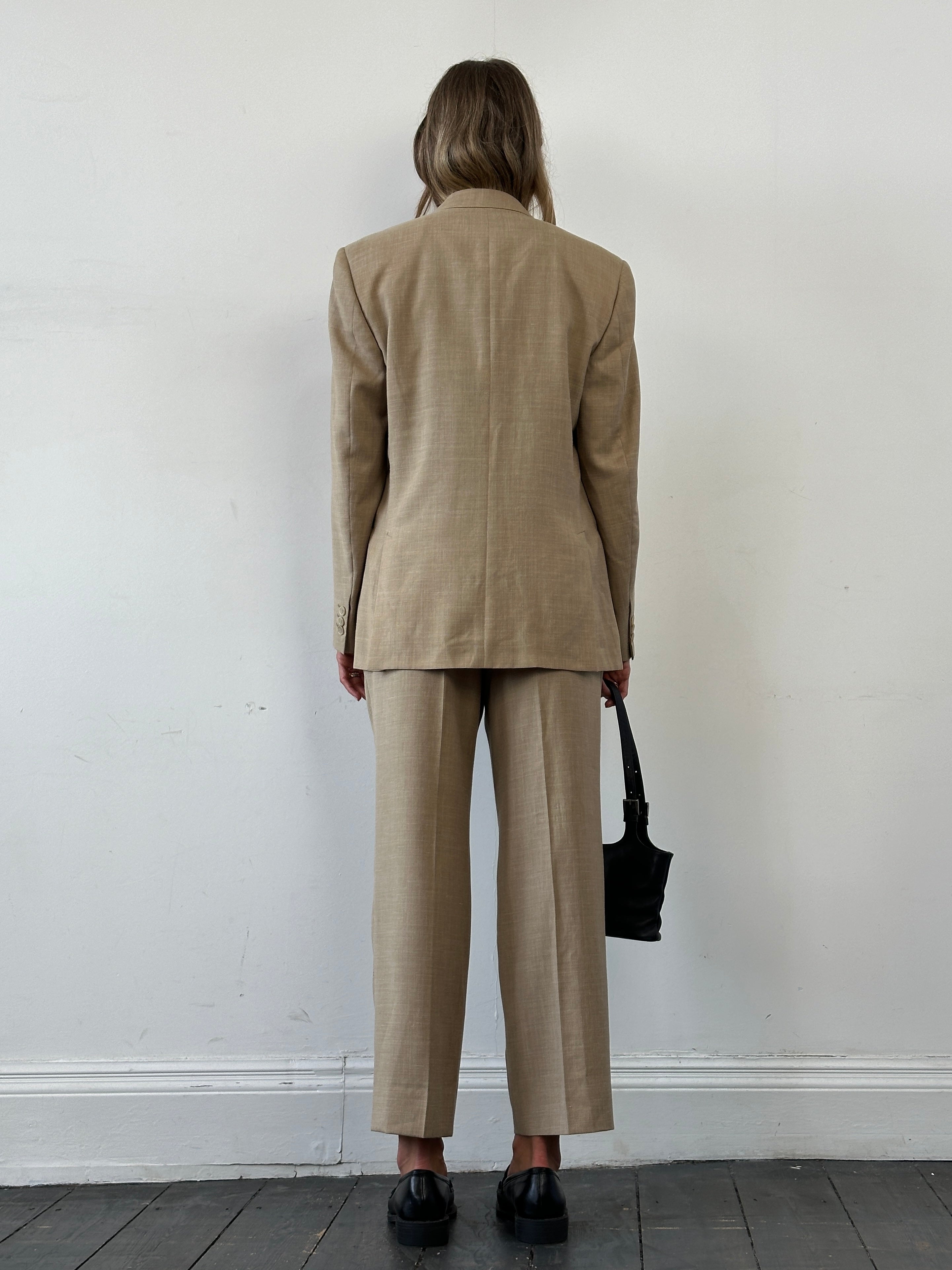Vintage single-breasted wool linen blend jumpsuit in size 36R/W31, displayed with front view and tailored fit.