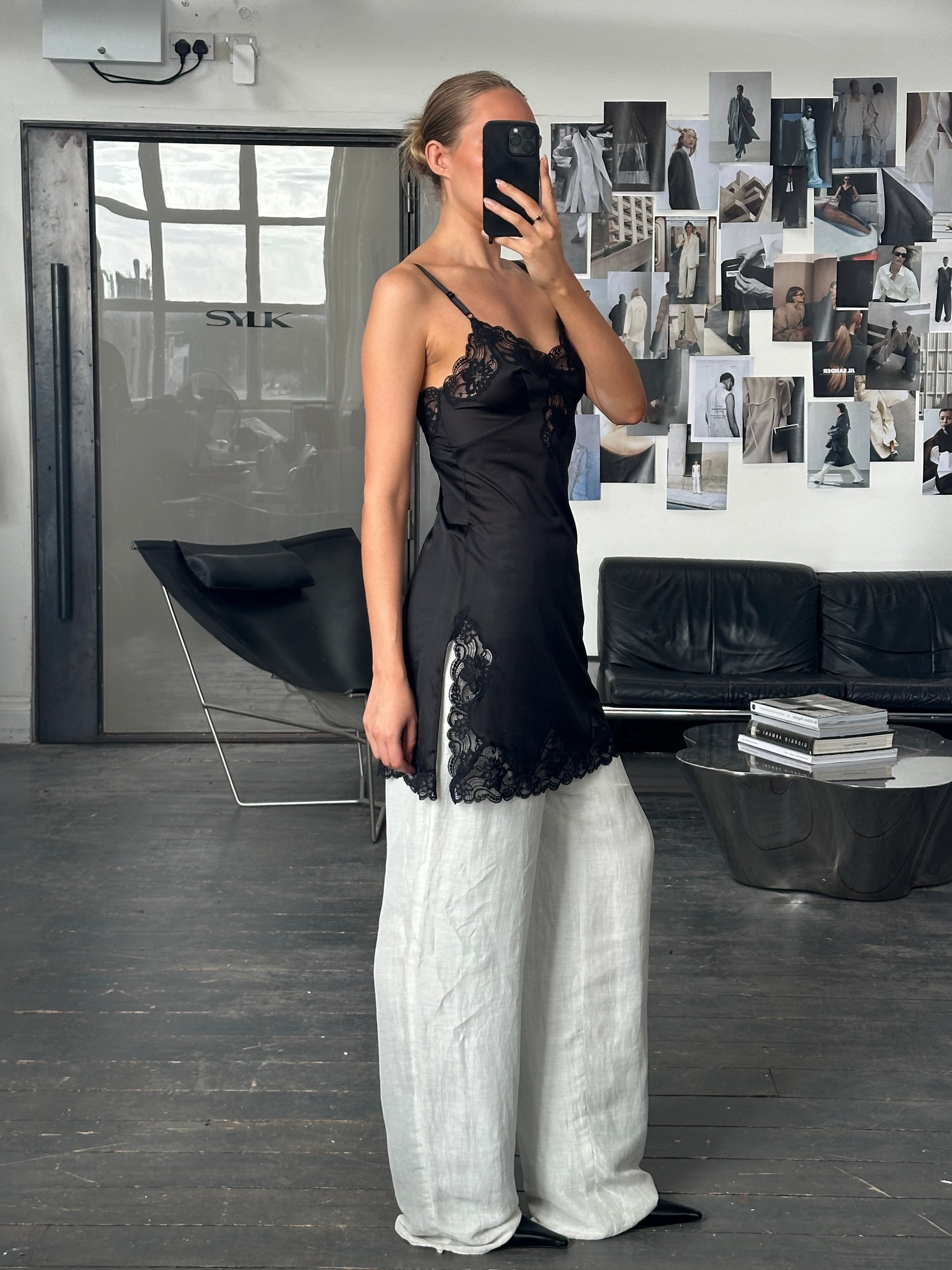 Vintage 2000s lace side split mini slip dress in size S, featuring delicate lace details and a fitted silhouette.