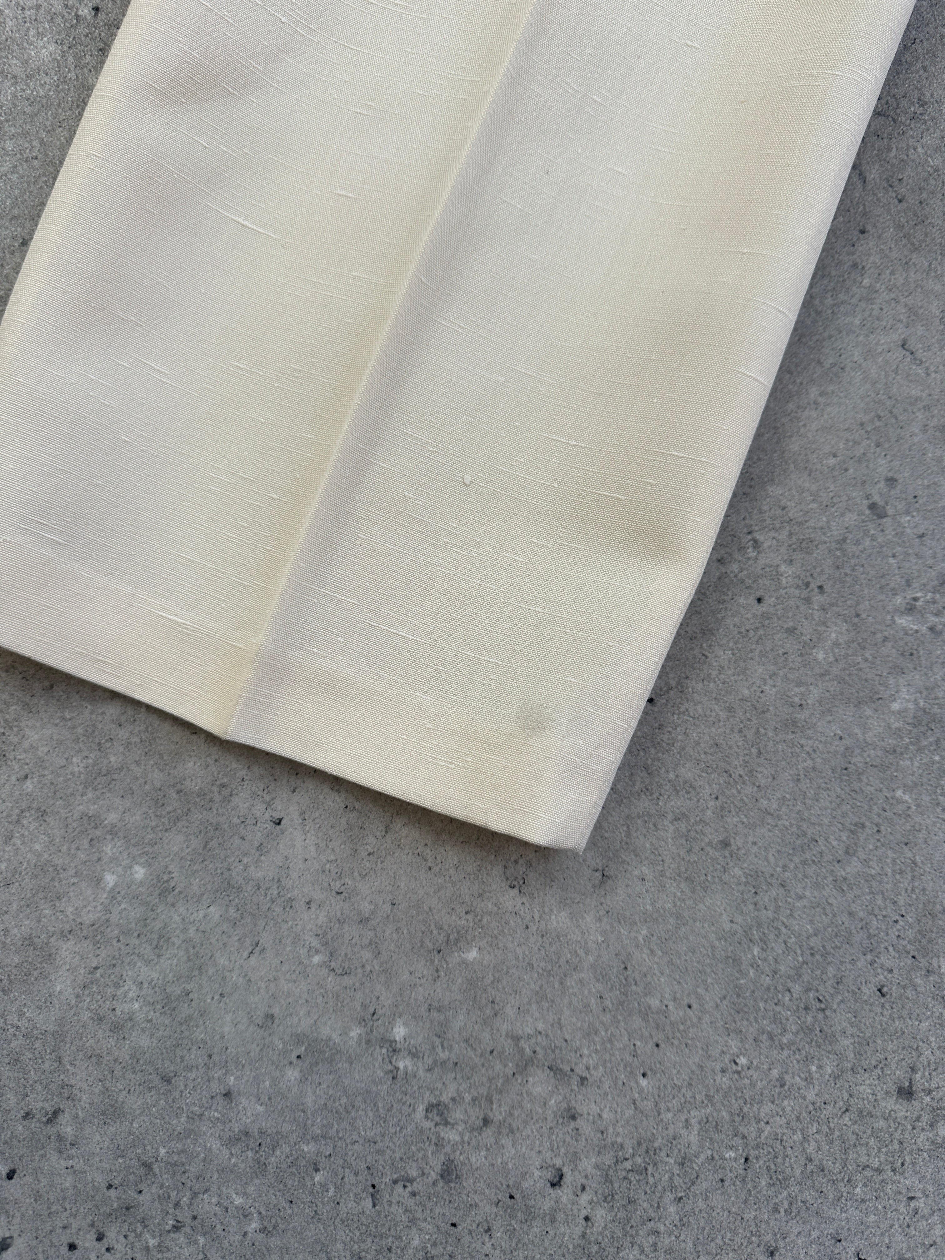 Vintage 1990s high-waisted tailored straight-leg trousers in classic fabric, displayed on a neutral background.