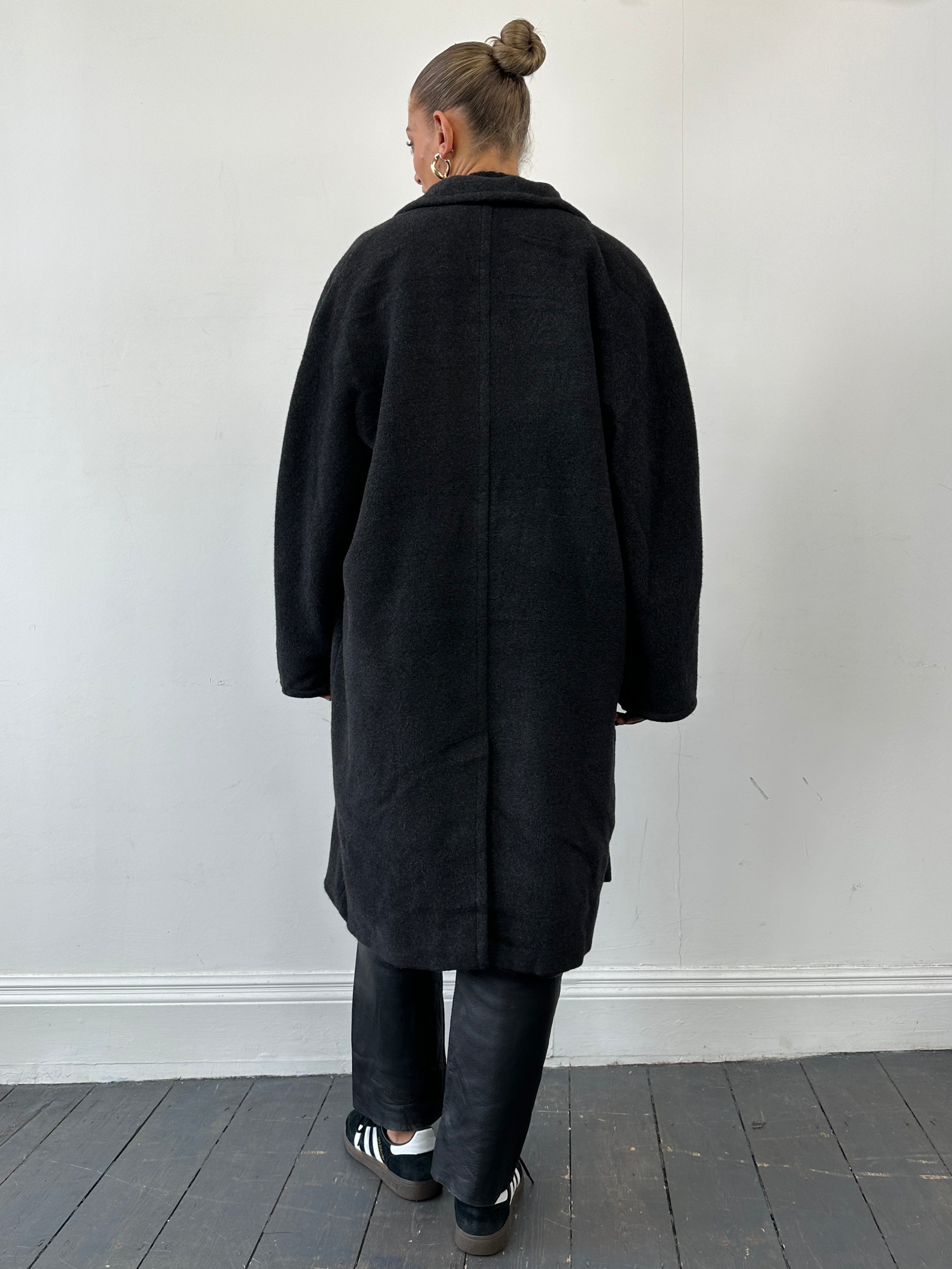 Marella wool cashmere double-breasted coat in XL, shown on a hanger with front view, featuring classic lapel collar and button details.