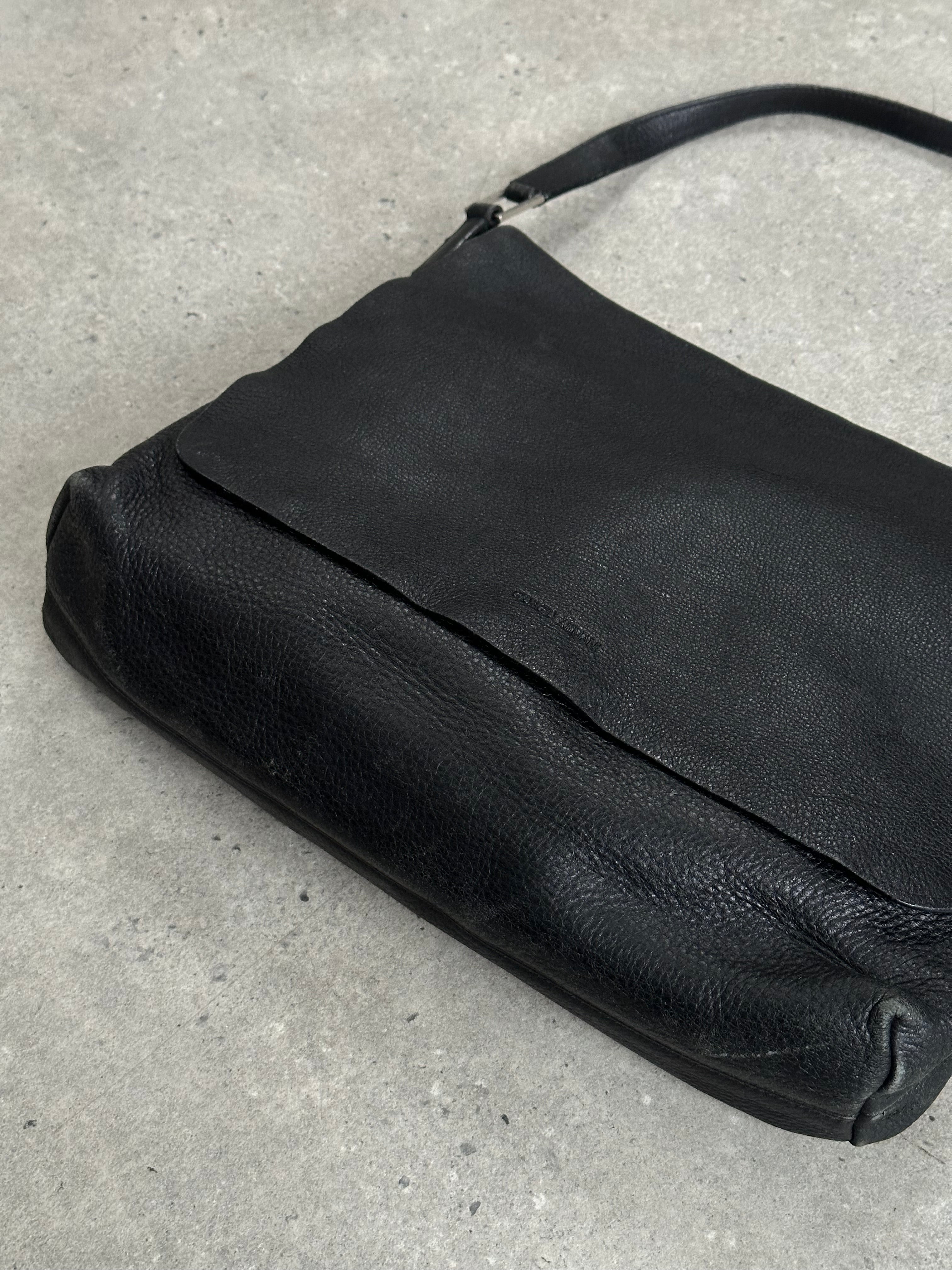 Giorgio Armani 2000s leather crossbody bag with sleek design and adjustable strap, featuring classic Armani branding and craftsmanship.