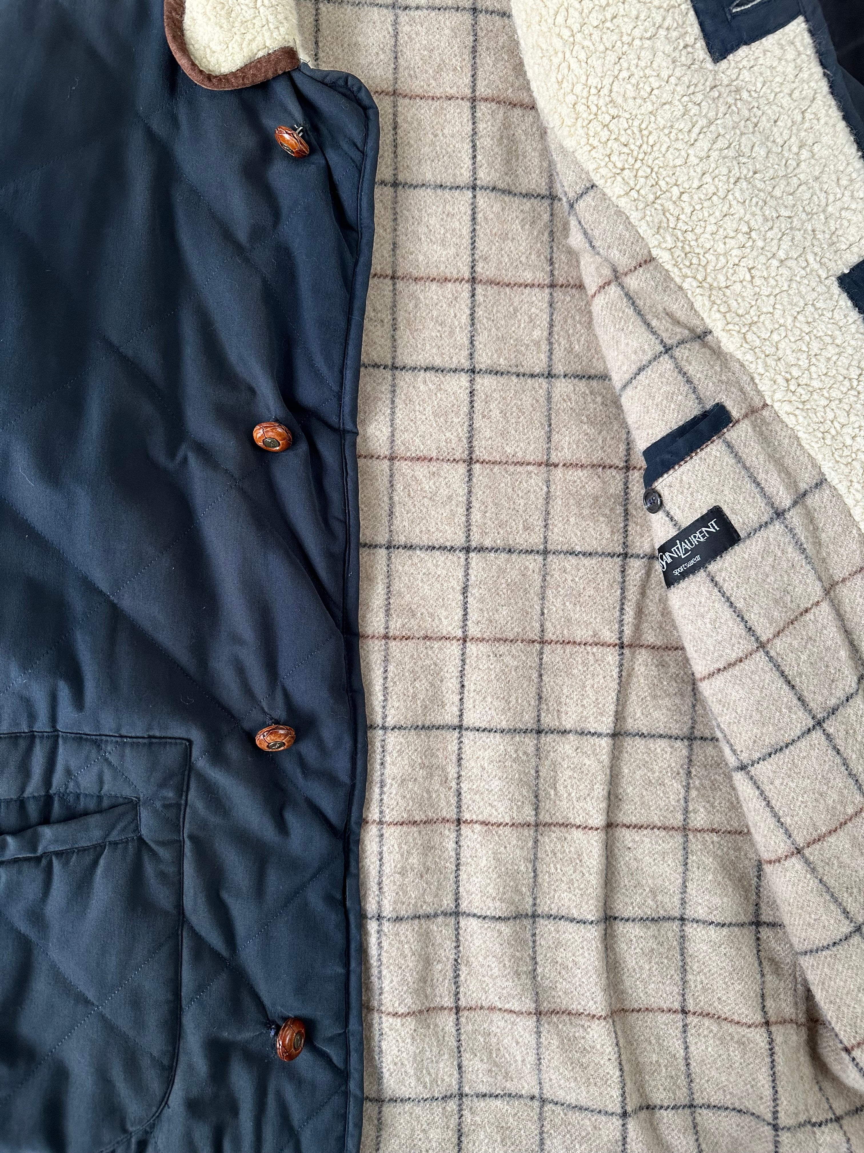 Yves Saint Laurent wool-lined jacket in XL, shown on a hanger with visible soft wool interior and stylish outer design.