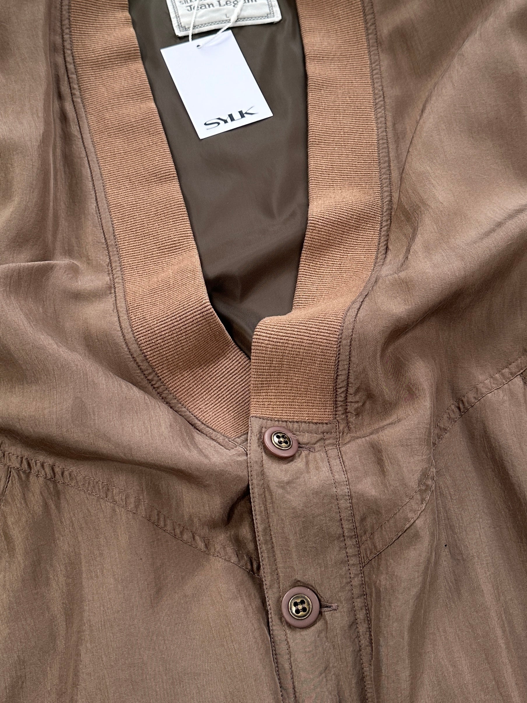 Vintage pure silk bomber jacket in XL with a smooth, shiny fabric, classic design, and ribbed cuffs and collar.