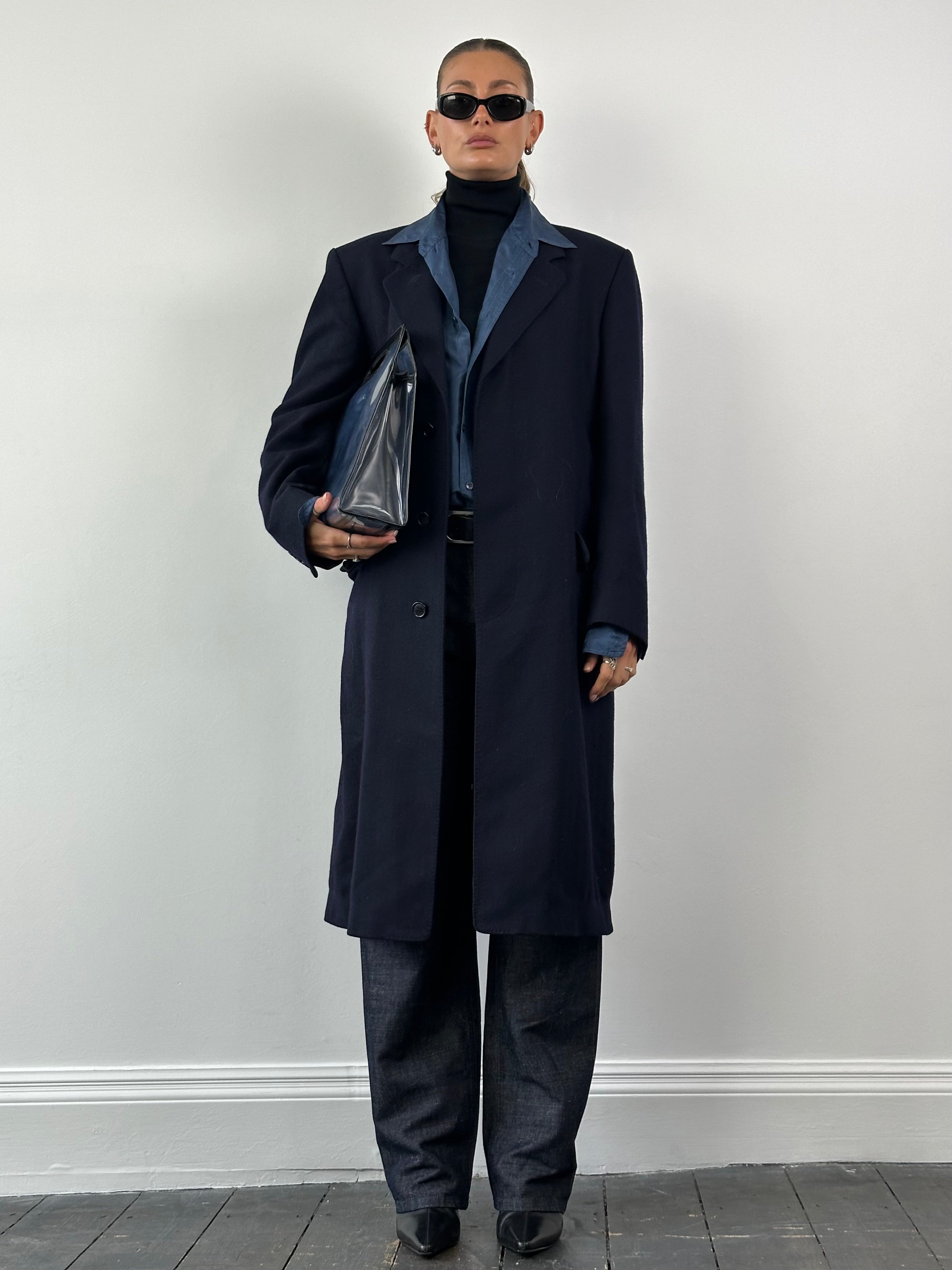 Christian Dior XL wool coat with concealed placket, showcasing a sleek tailored design and high-quality fabric.