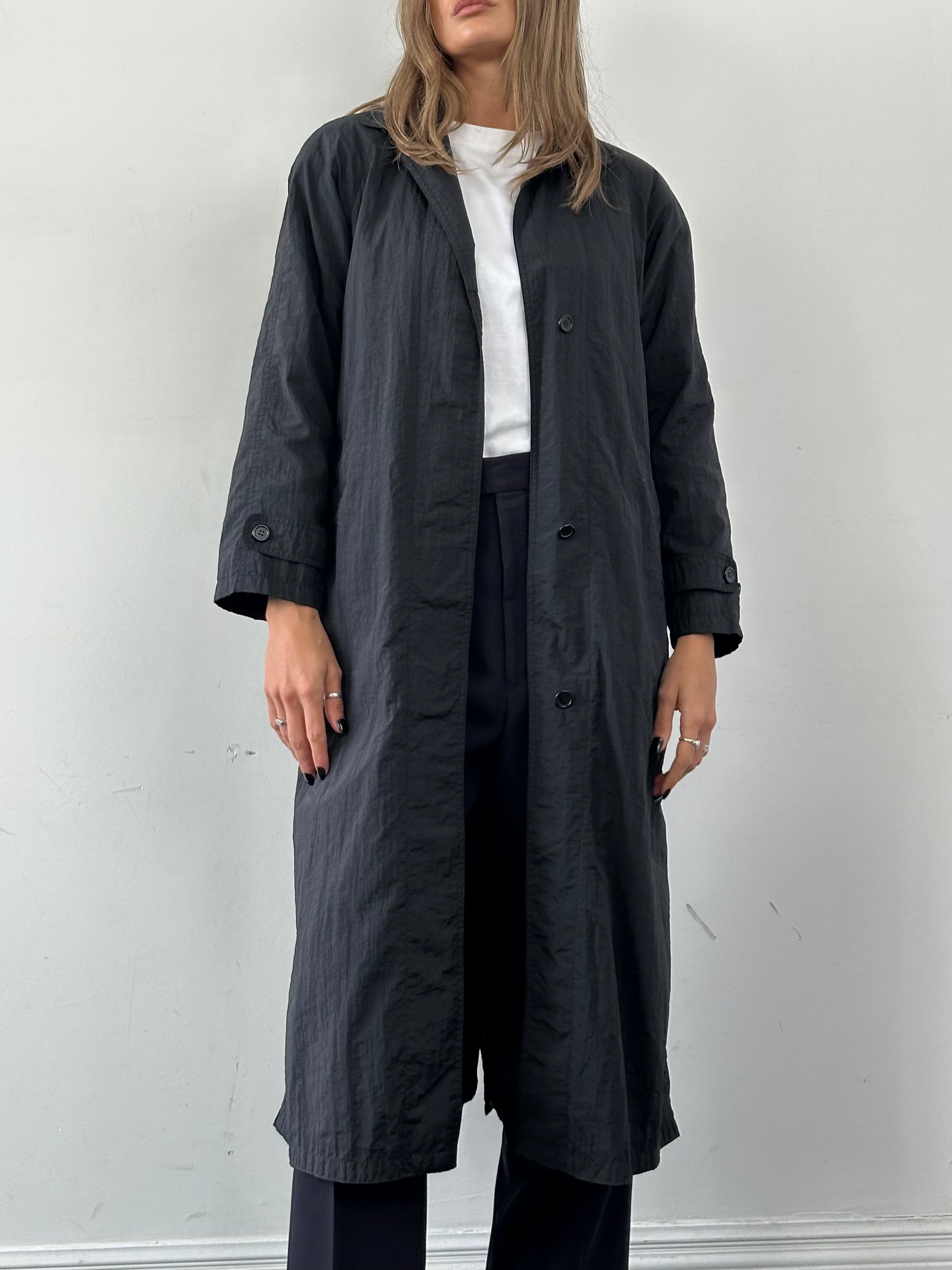 Vintage nylon trench coat with concealed placket, lightweight design, and classic style in size S.