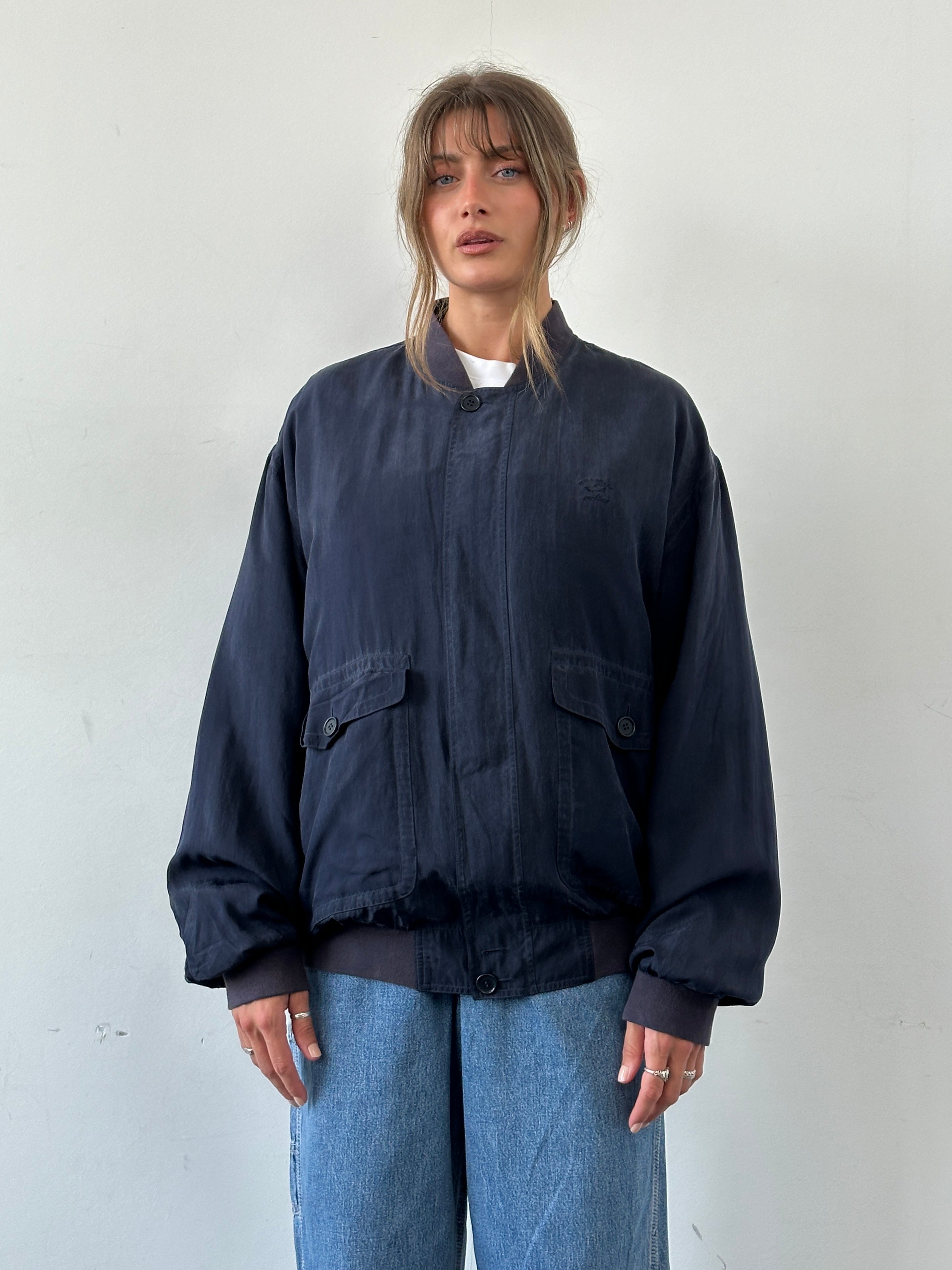 Paul & Shark pure silk bomber jacket in XXL, shown in a close-up image highlighting the smooth silk fabric and stylish design.
