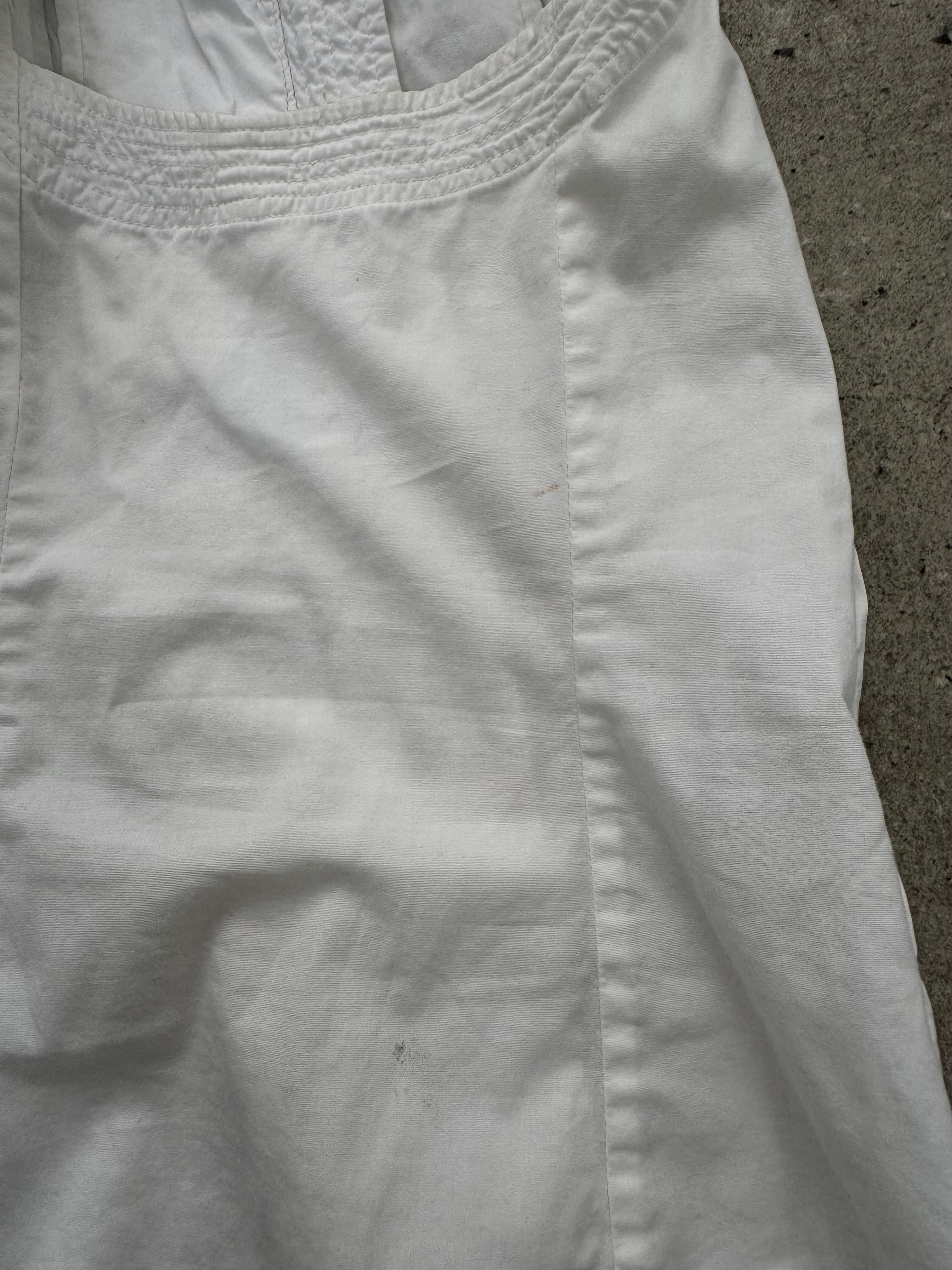 DKNY 2000s pleated cotton sleeveless top in white, showing its classic design and lightweight fabric.