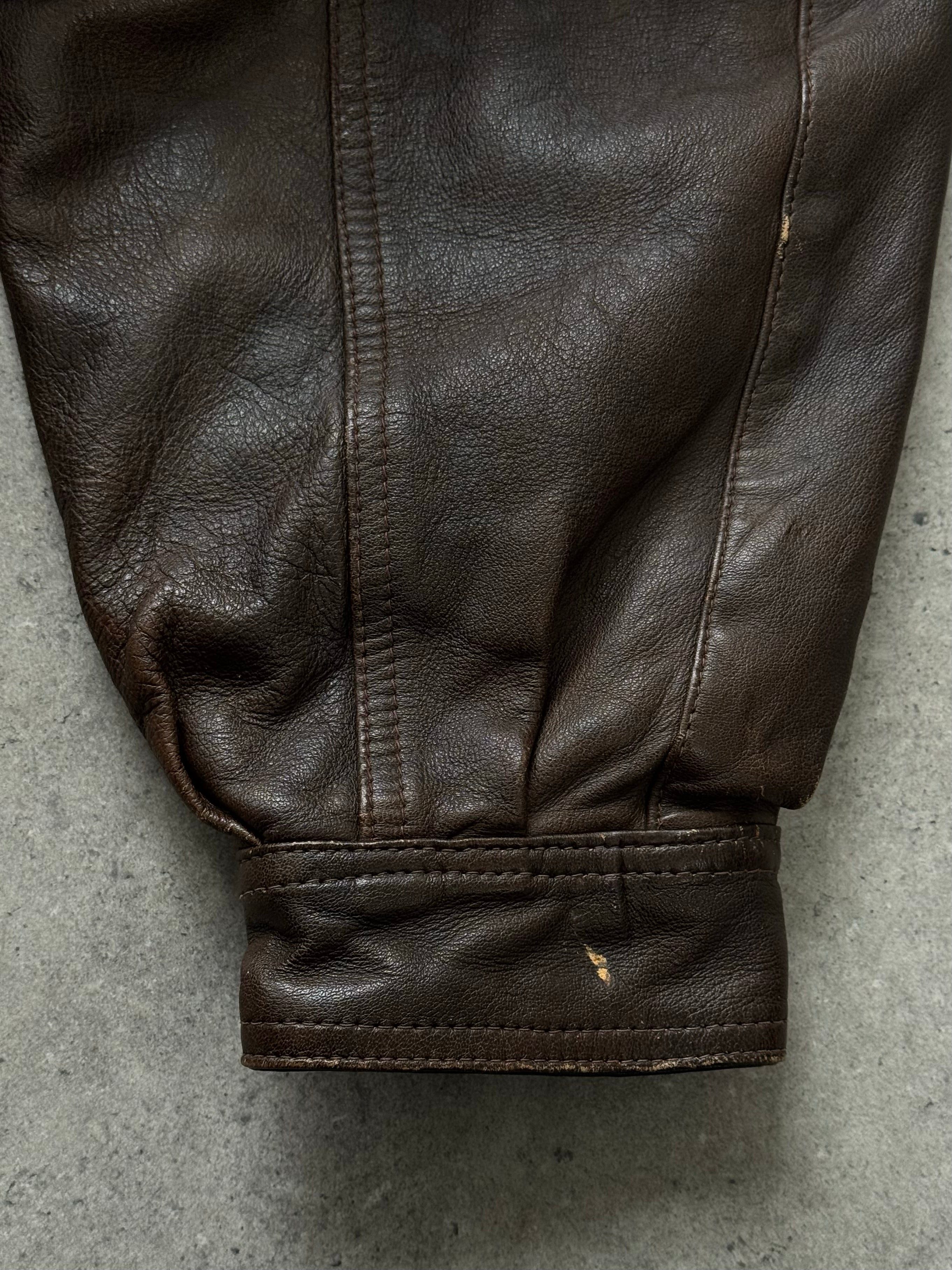 Vintage 1990s leather high neck bomber jacket, XL size, with classic collar and front zipper, crafted from brown leather.
