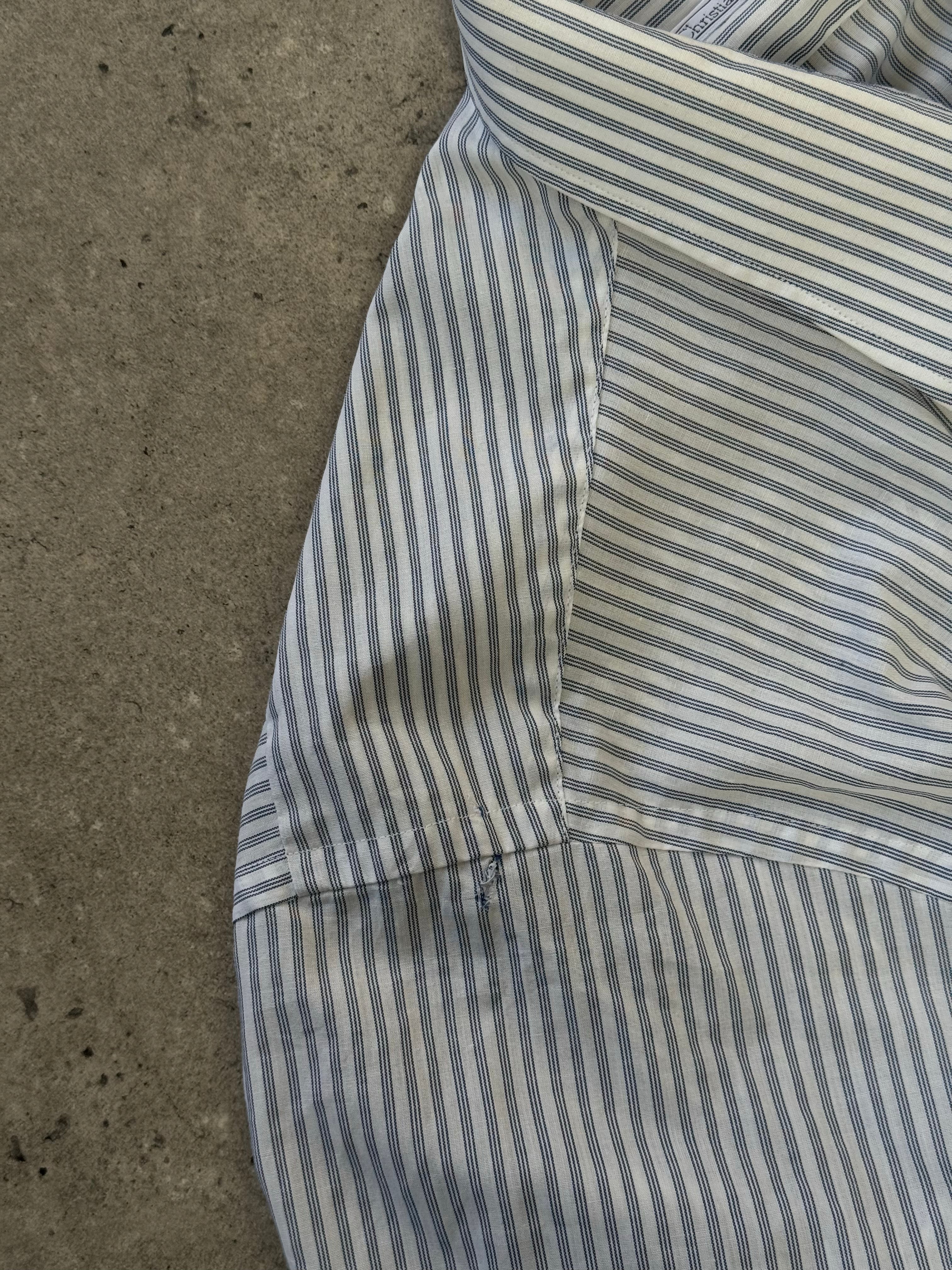 Christian Dior 1990s cotton striped logo shirt in size L, featuring classic Dior branding and a casual striped design.