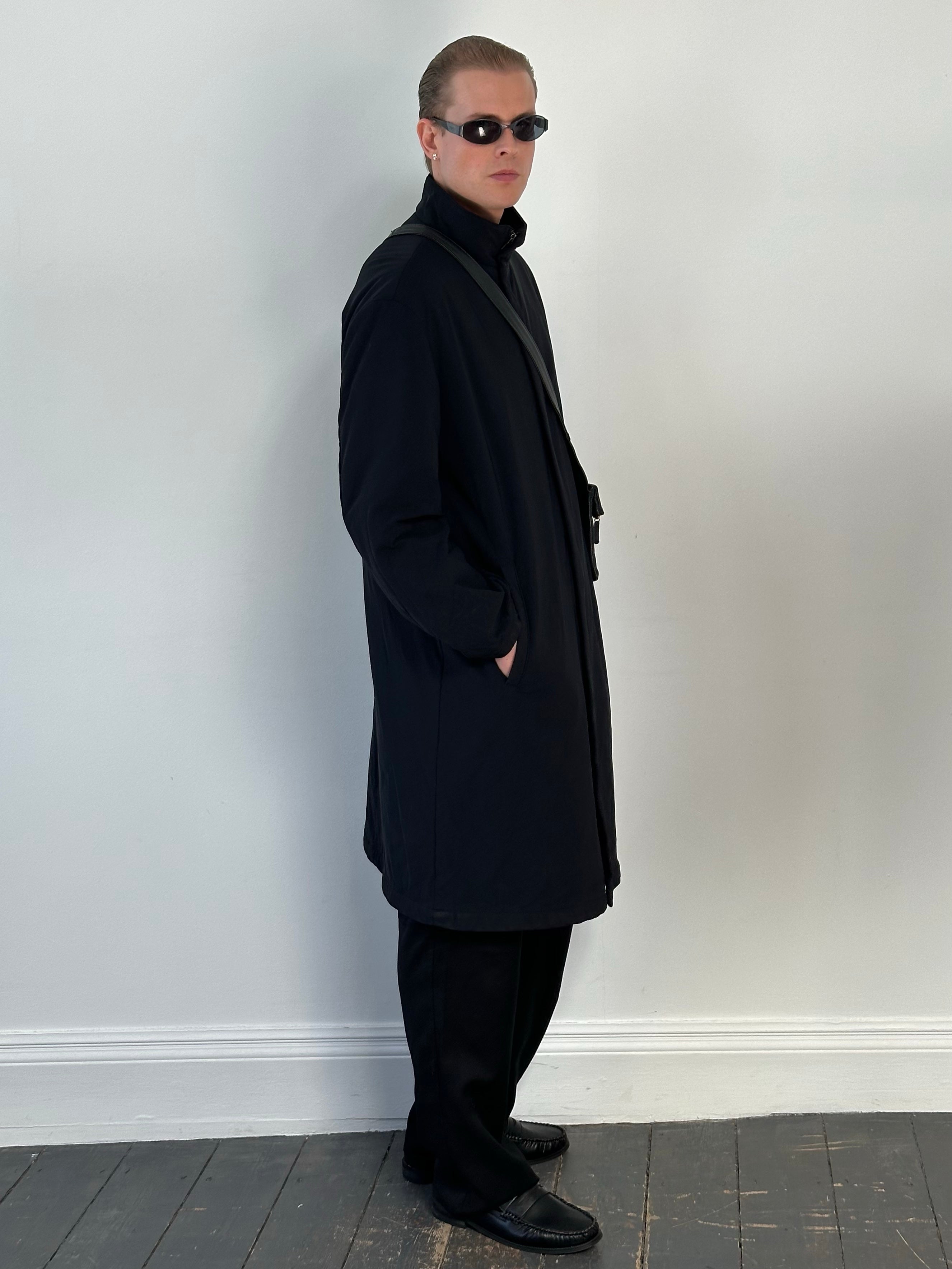Hugo Boss 2000s cotton high neck double zip trench coat in size L, shown on a hanger, with a high collar and double front zippers.