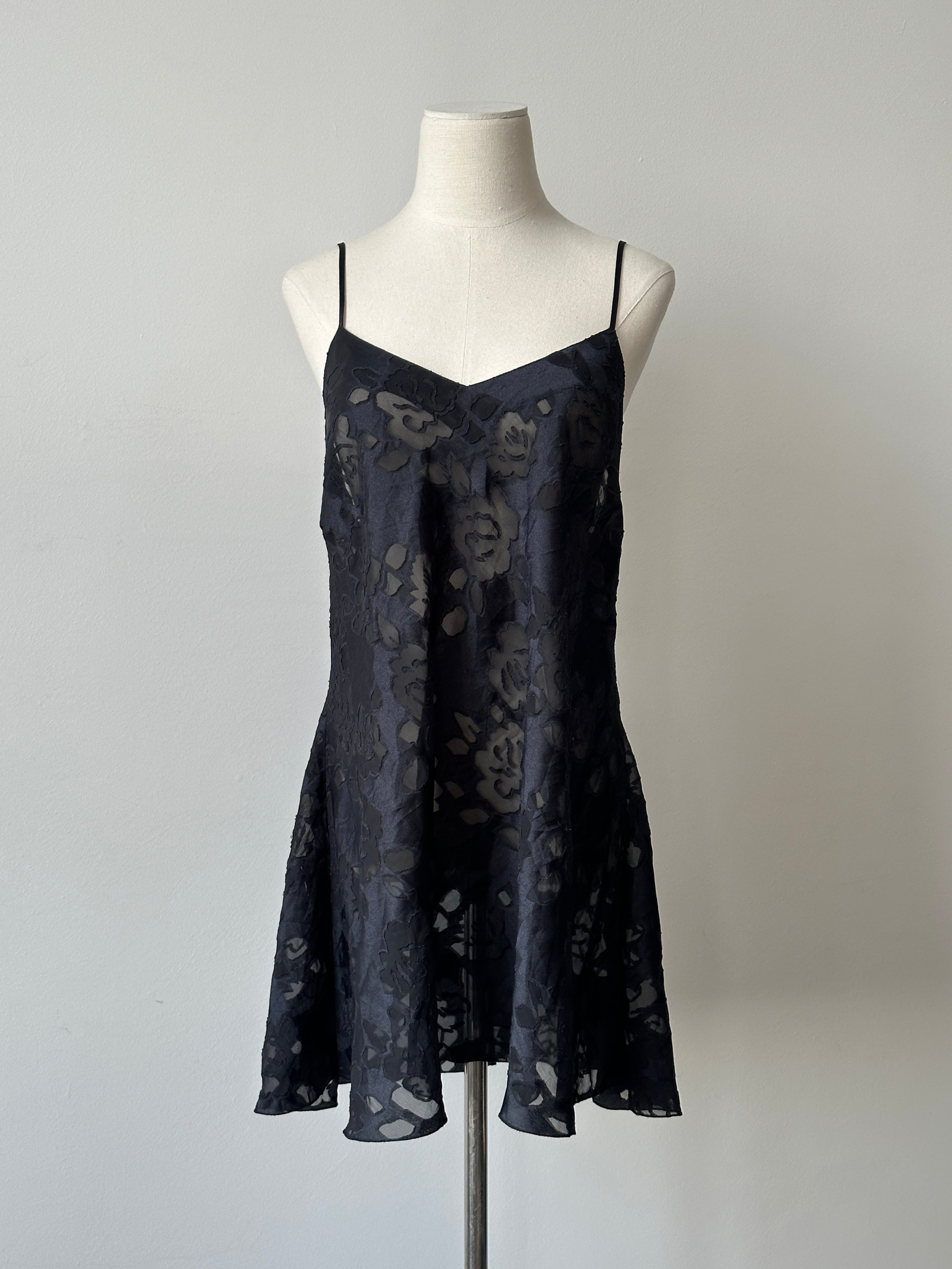 Victoria's Secret 1990s sheer dress in size L, flowing fabric, and vintage style, shown on a hanger against a neutral background.