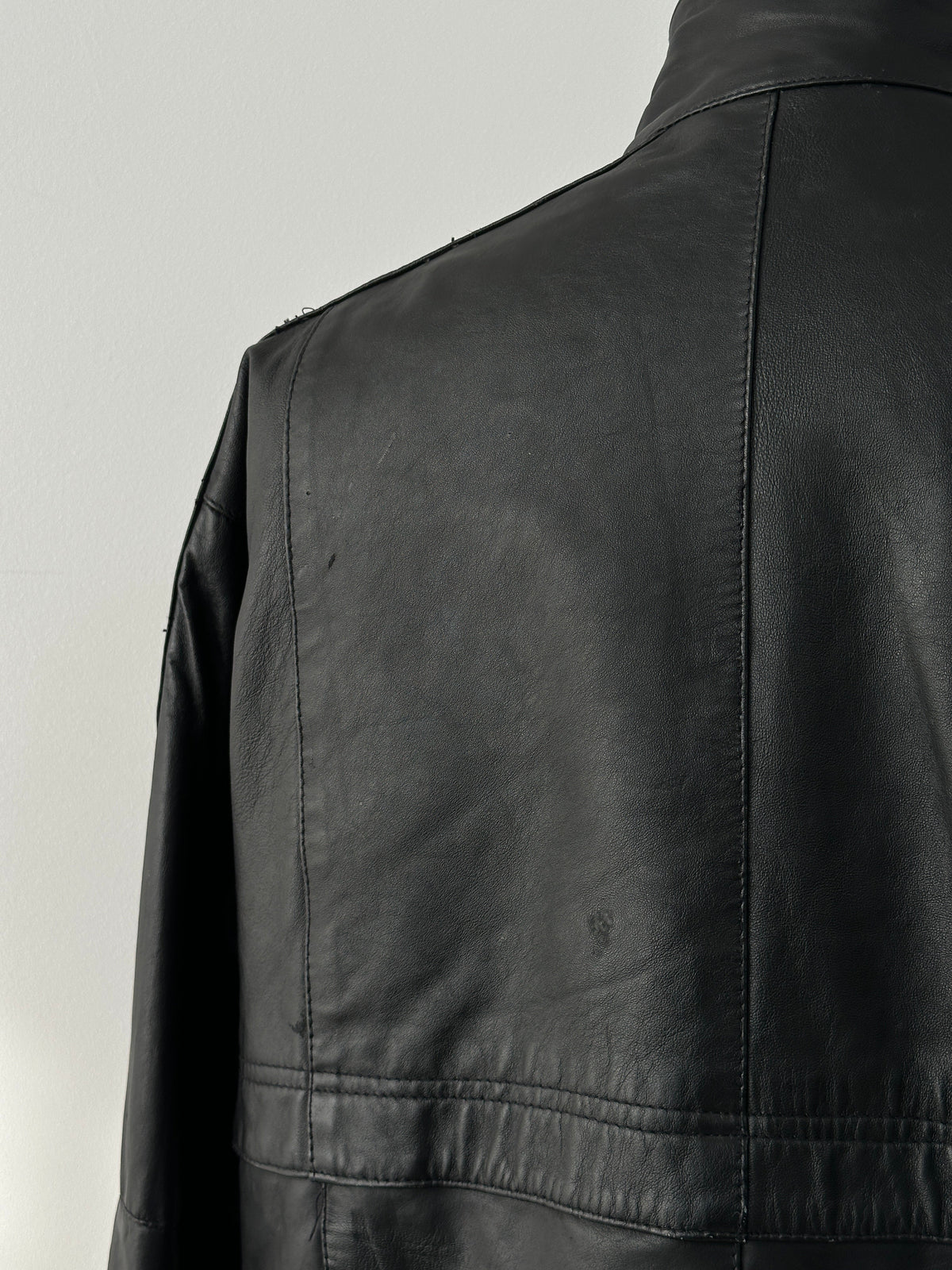 Vintage 1990s high neck leather jacket in XL with classic design, showcasing smooth black leather and stylish collar detail.
