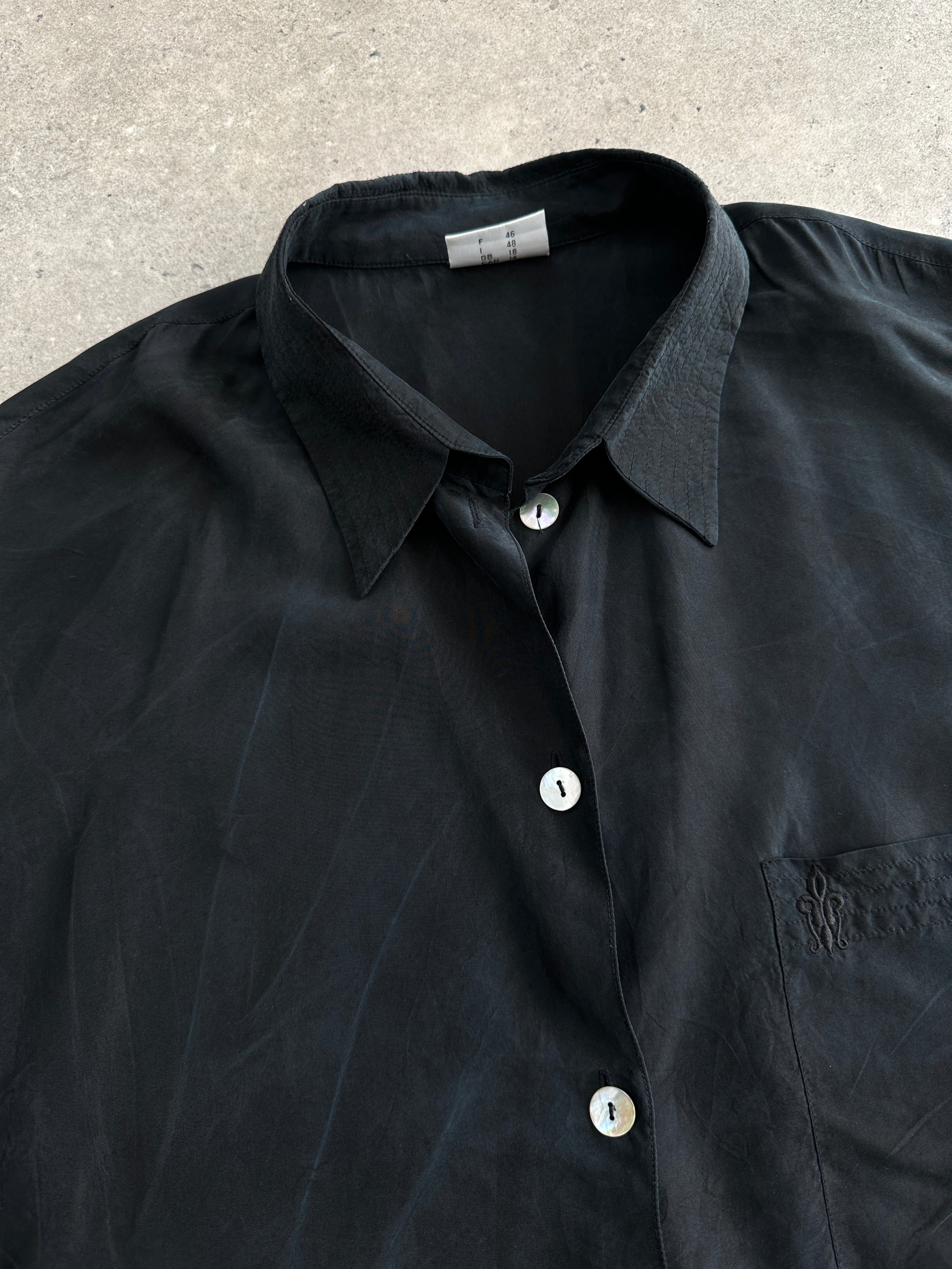 Vintage pure silk short sleeve shirt in XL size, featuring a classic design with a smooth, shiny fabric and neat collar.