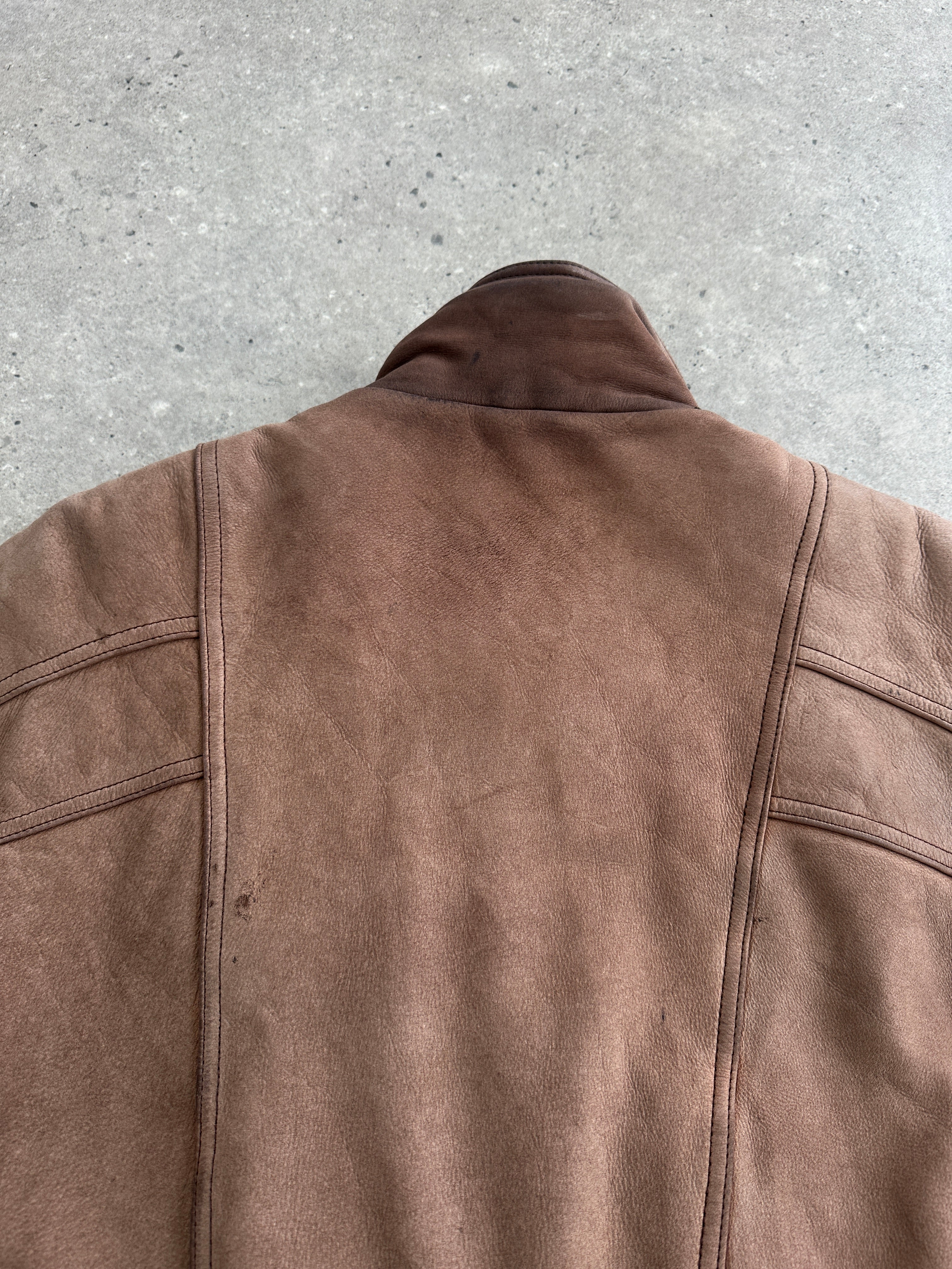 Vintage 1990s high neck leather bomber jacket with aged finish, size large, featuring classic style and distressed leather details.