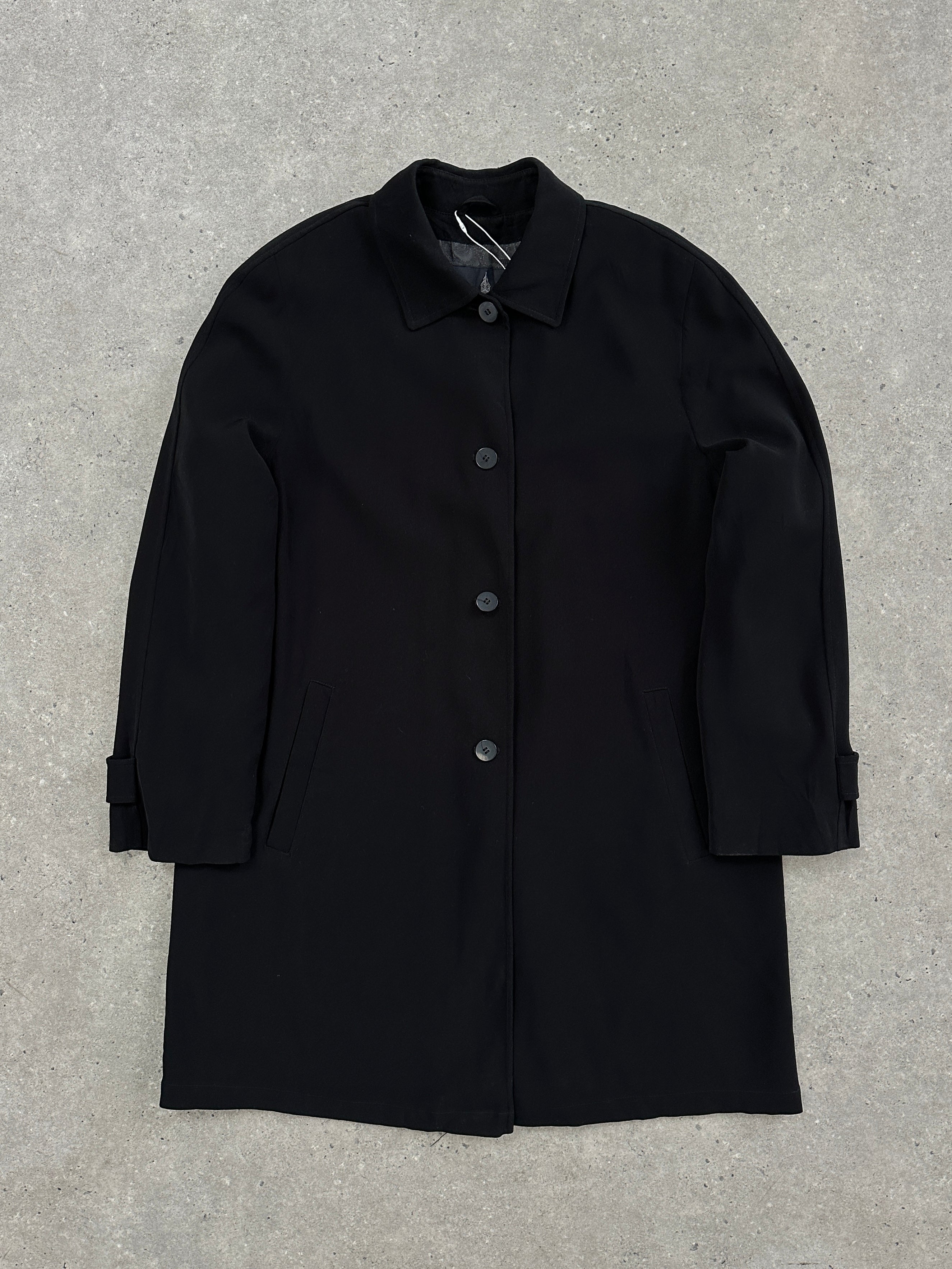 London Fog single-breasted trench coat in size XL, showing its classic beige color, belted waist, and button details.