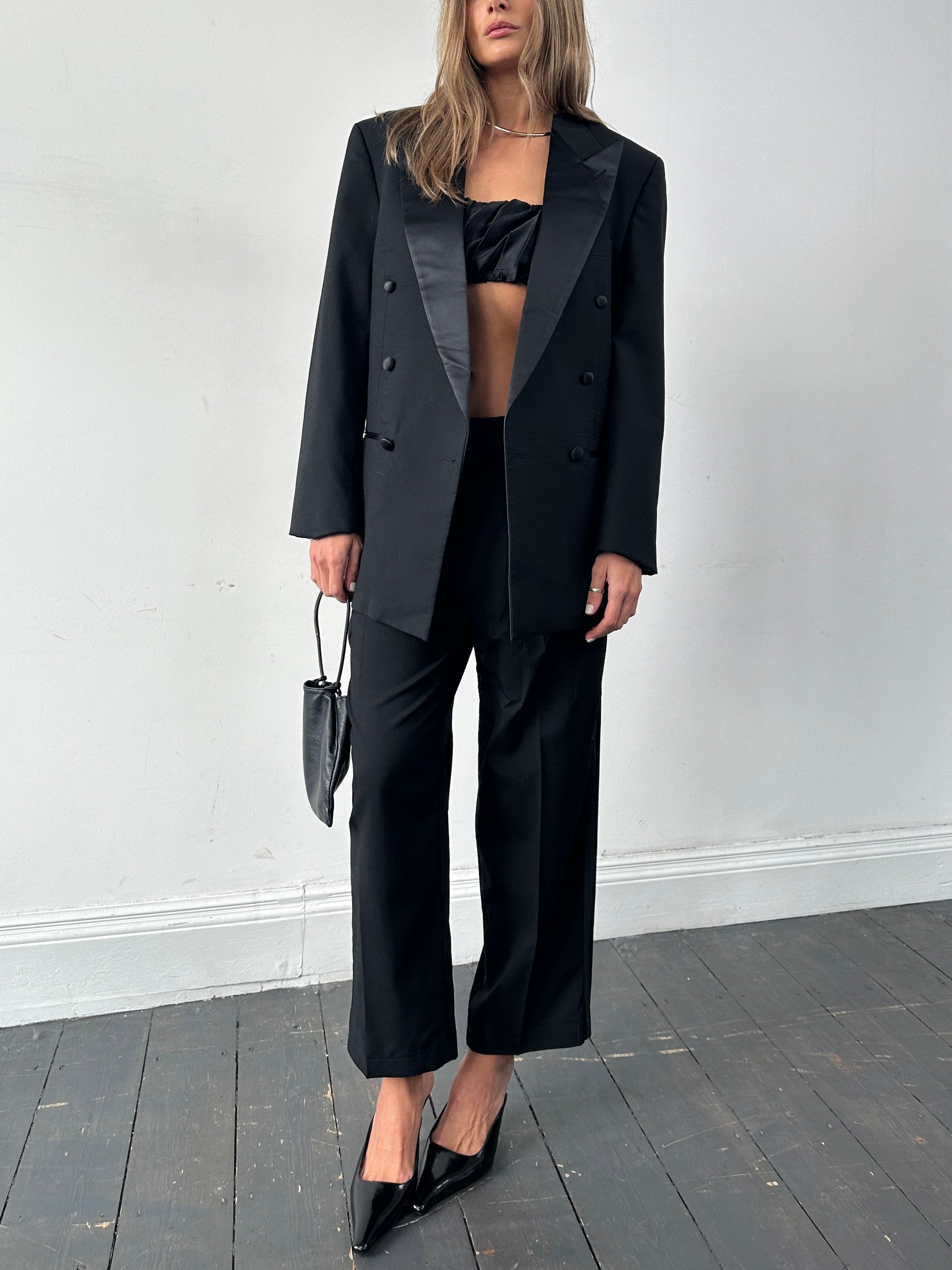 Vintage pure wool double-breasted tuxedo jumpsuit, size 38R/W26-32, featuring classic lapels and tailored fit.