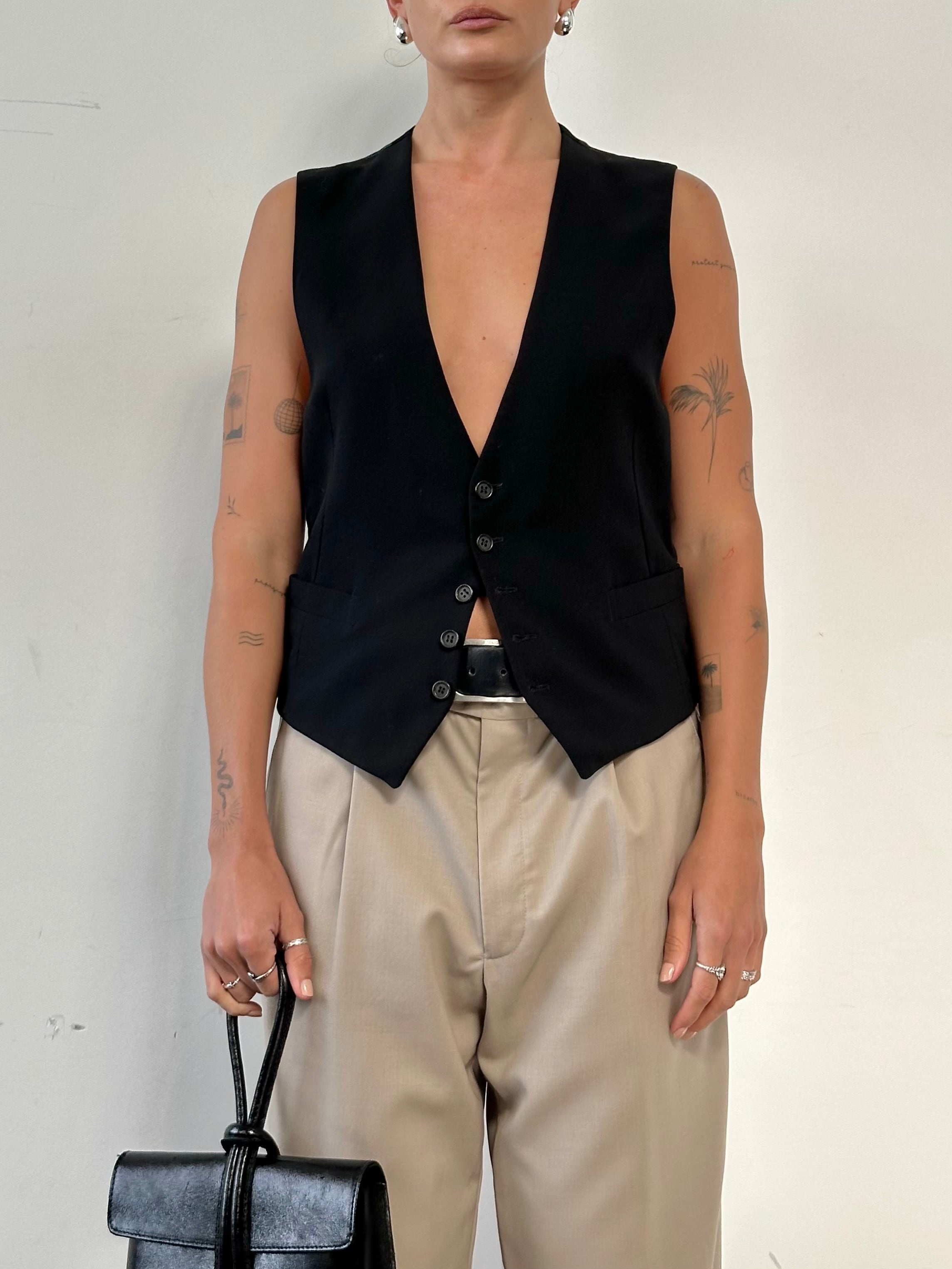 Giorgio Armani Classico wool tailored waistcoat in size XS/S, featuring a sleek design and classic fit for formal wear.