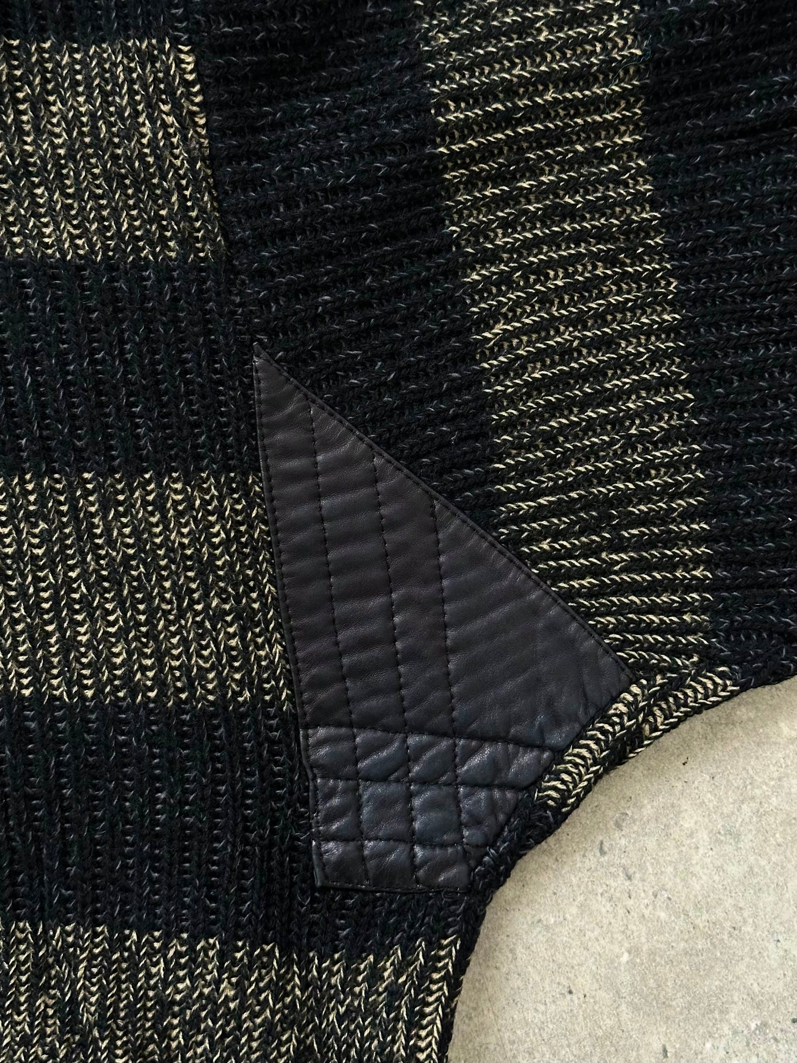 Vintage Italian 1990s wool and alpaca striped knitted jumper in XL/XXL, featuring colorful horizontal stripes and cozy knit texture.