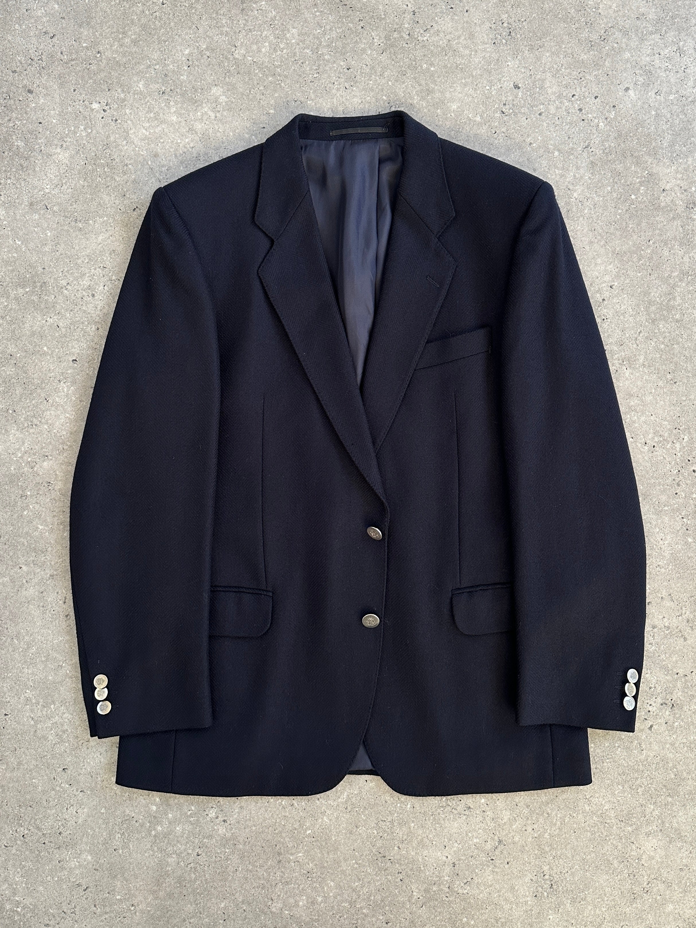 Vintage 1990s pure wool single-breasted blazer in size 38R, featuring classic tailored design and button closure.