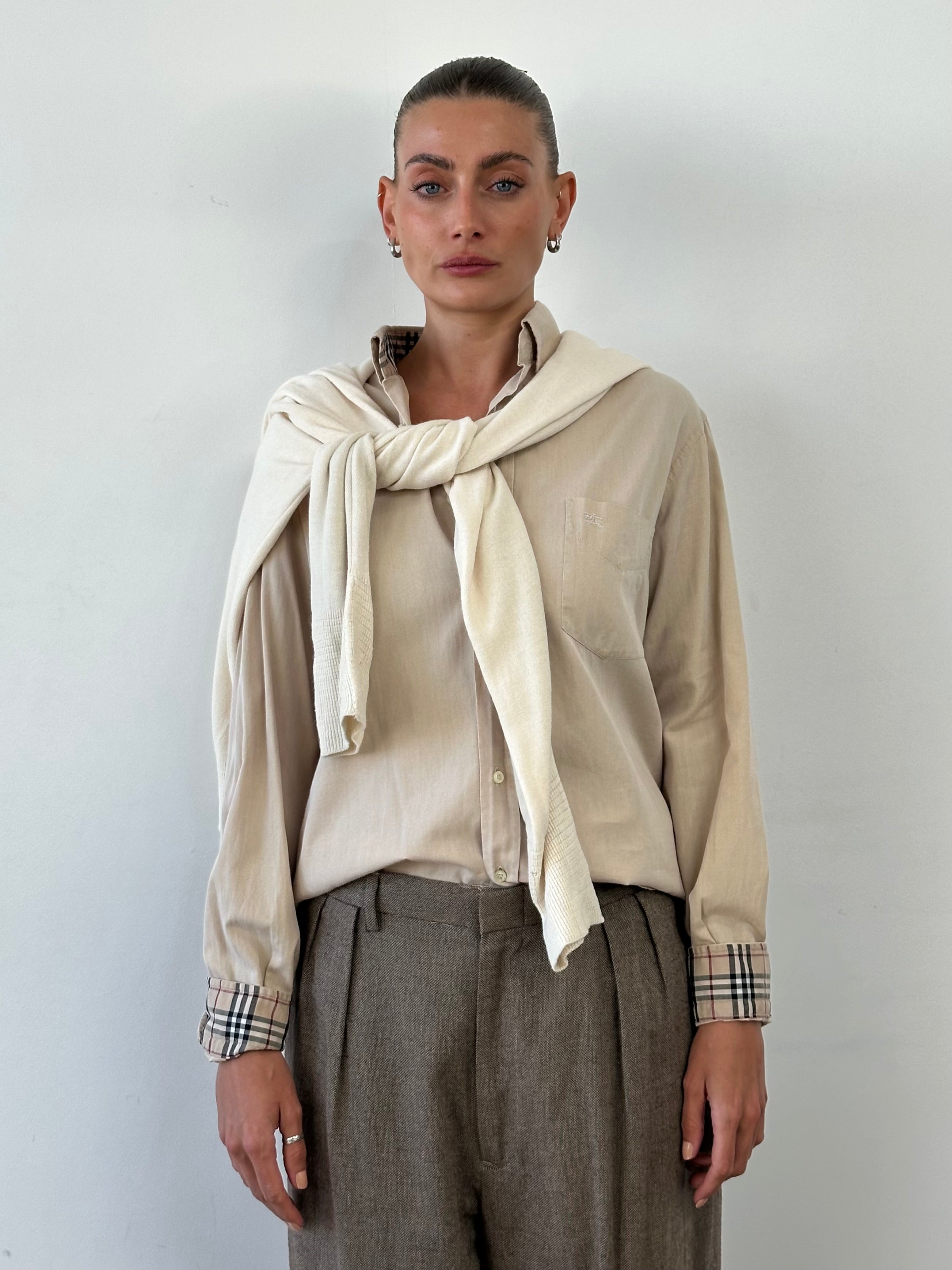 Burberry London pure cotton logo shirt in size M/L, featuring the iconic Burberry check pattern and classic button-up design.