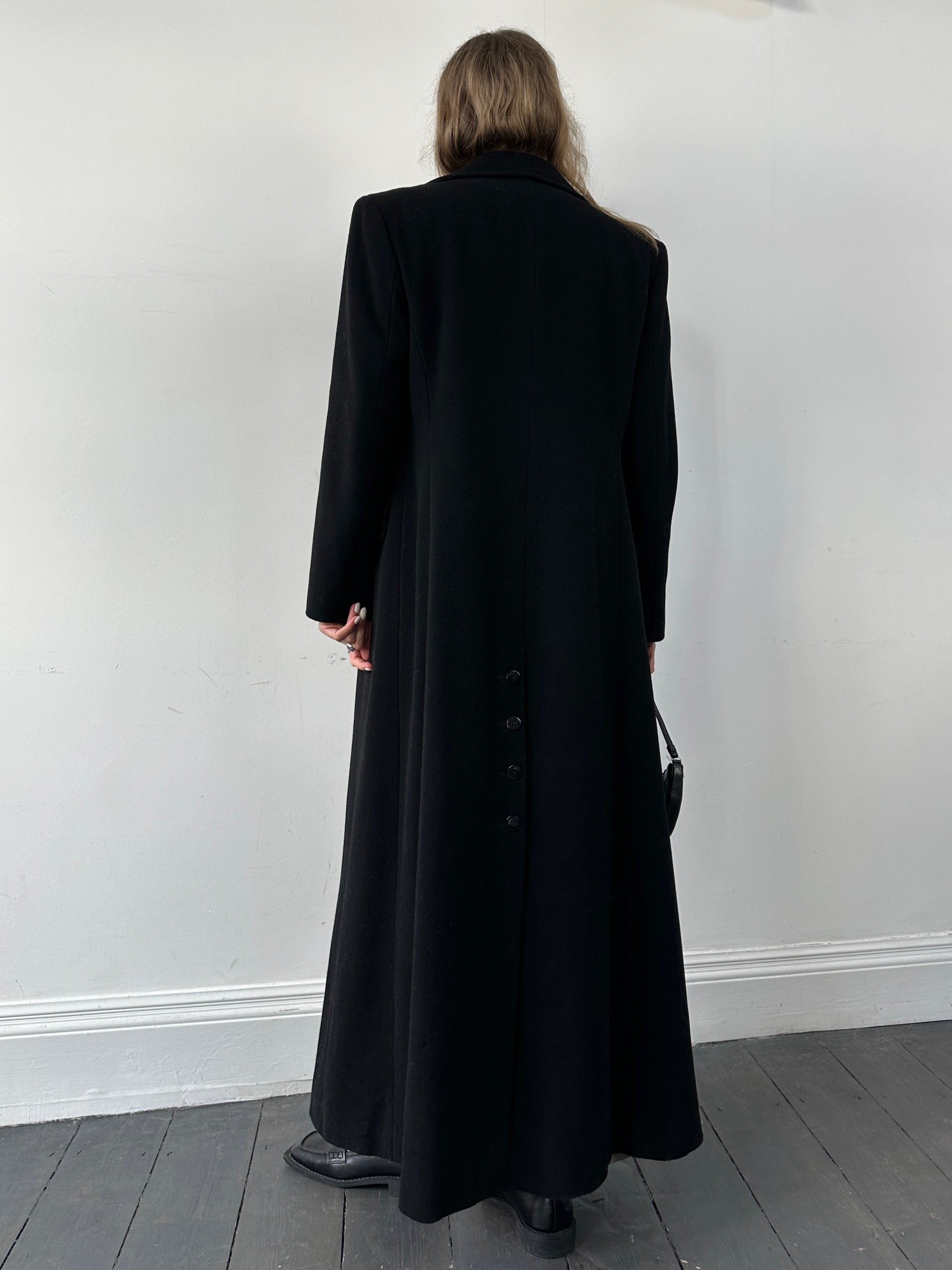 Vintage wool single-breasted A-line coat in size small, featuring classic design and warm, textured fabric.
