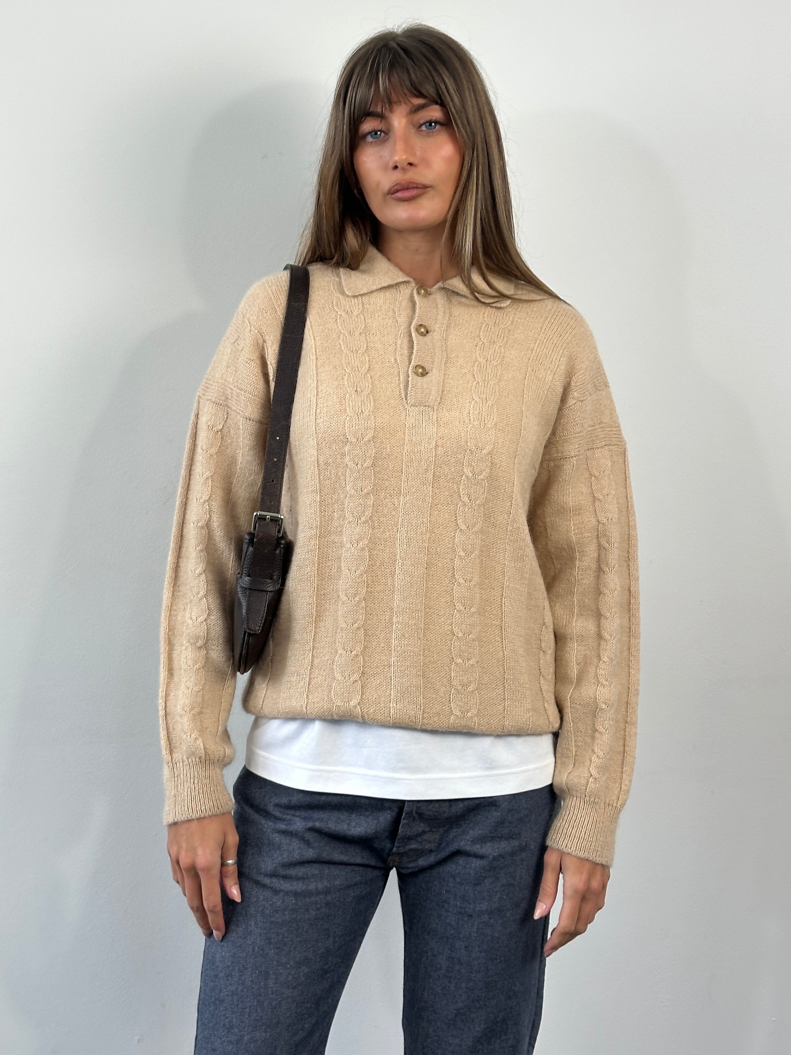Vintage 1980s wool mohair knitted polo jumper in size M, featuring a classic retro design and textured knit pattern.