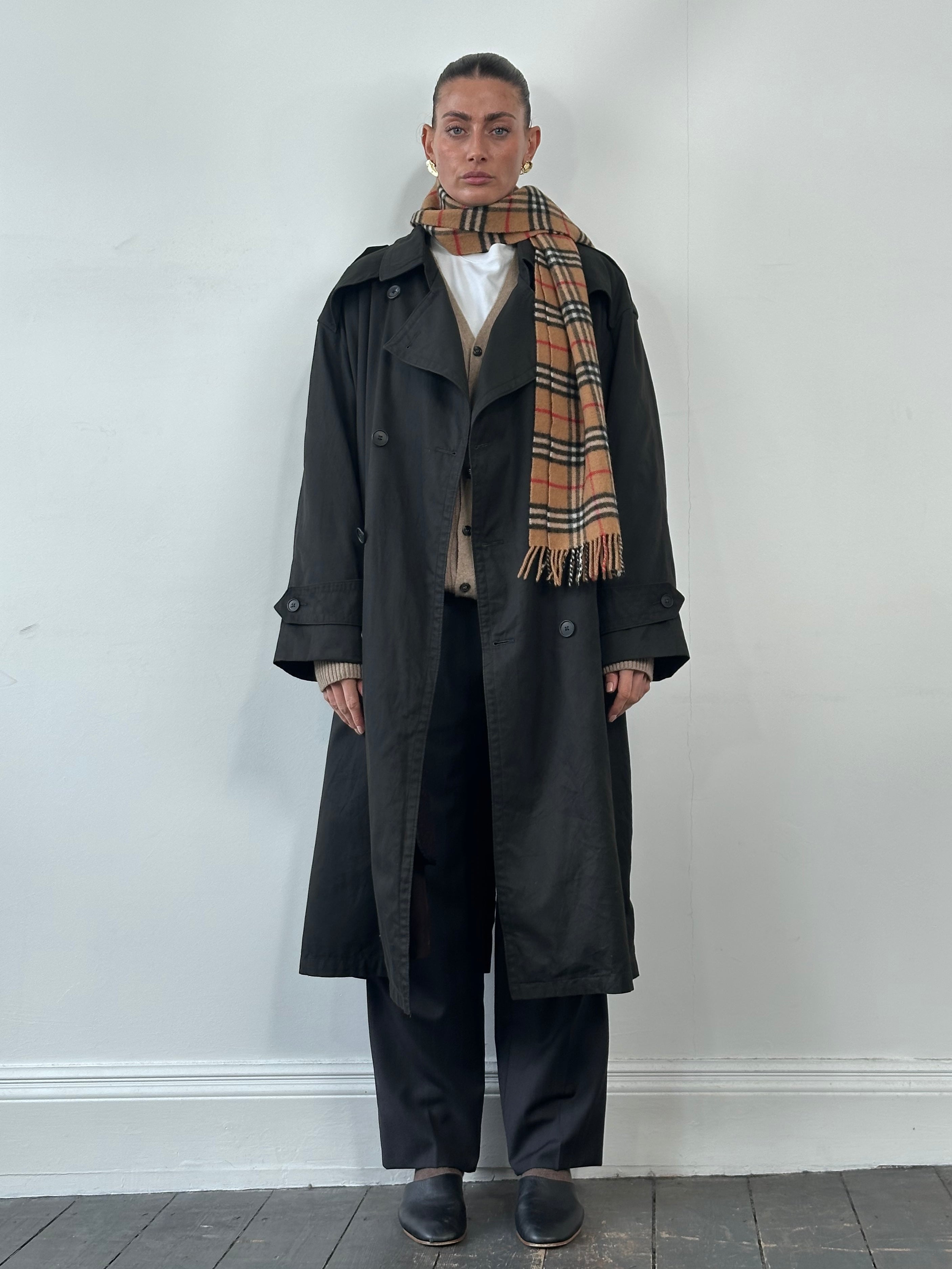 Christian Dior Monsieur double-breasted trench coat in XL, black fabric with classic design and button details.