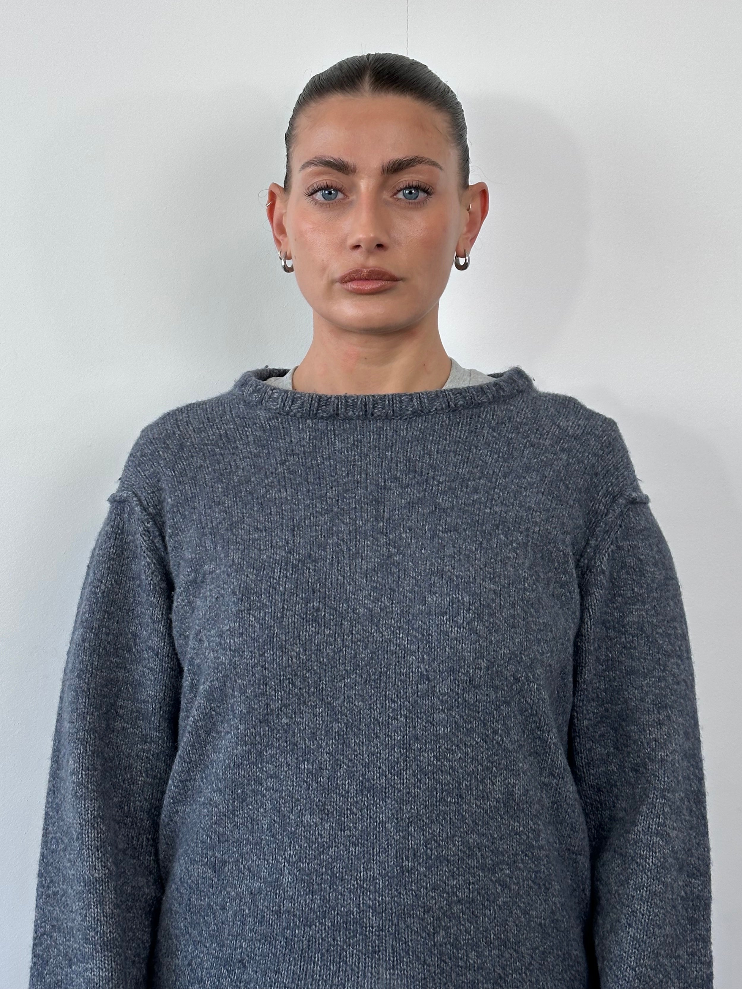 Armani Jeans wool knitted jumper in size M/L, featuring a cozy, textured design and a classic fit, perfect for casual wear.