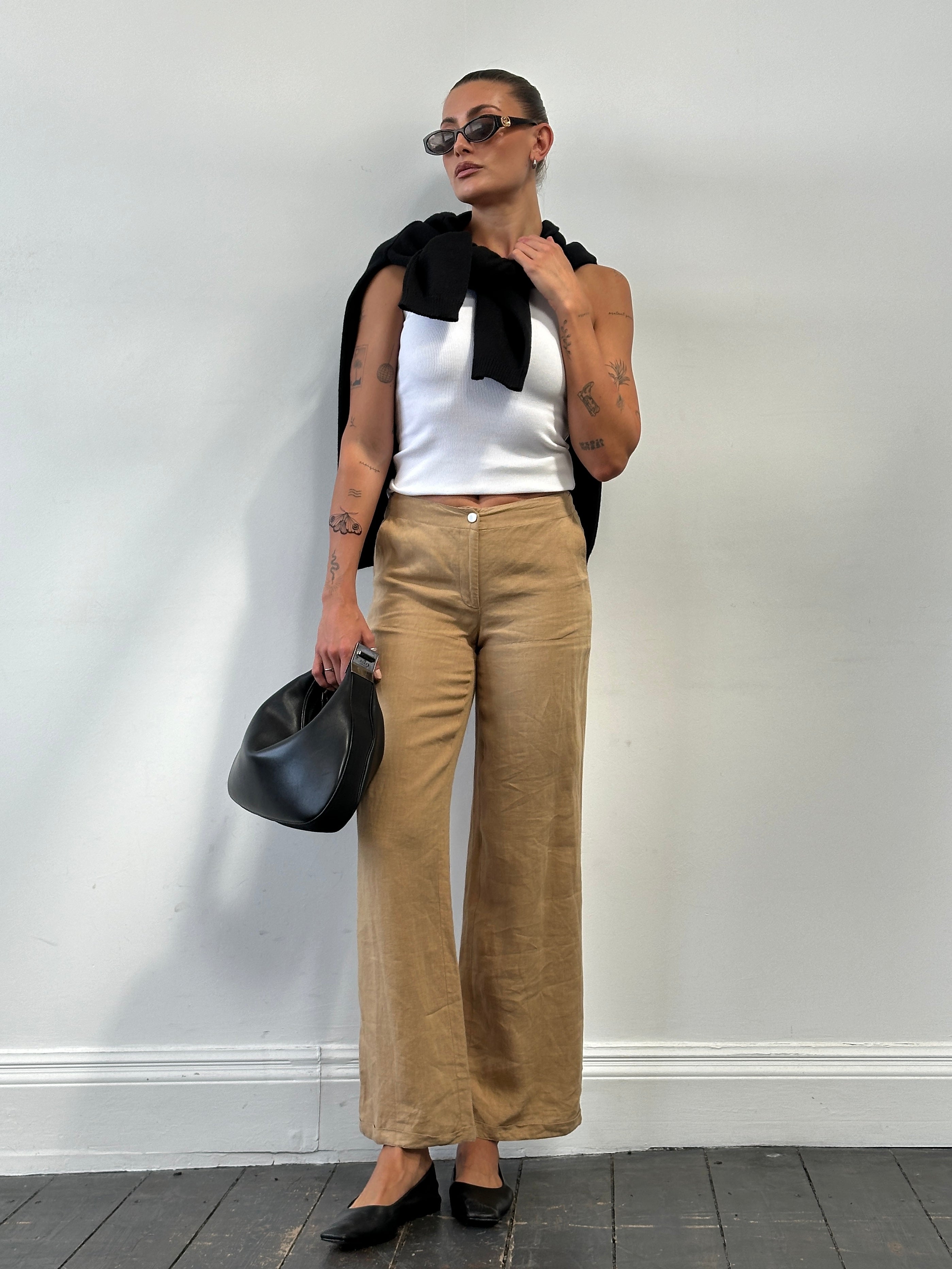 Vintage pure linen low waist wide-leg trousers in size W26, showcasing relaxed fit and classic style.