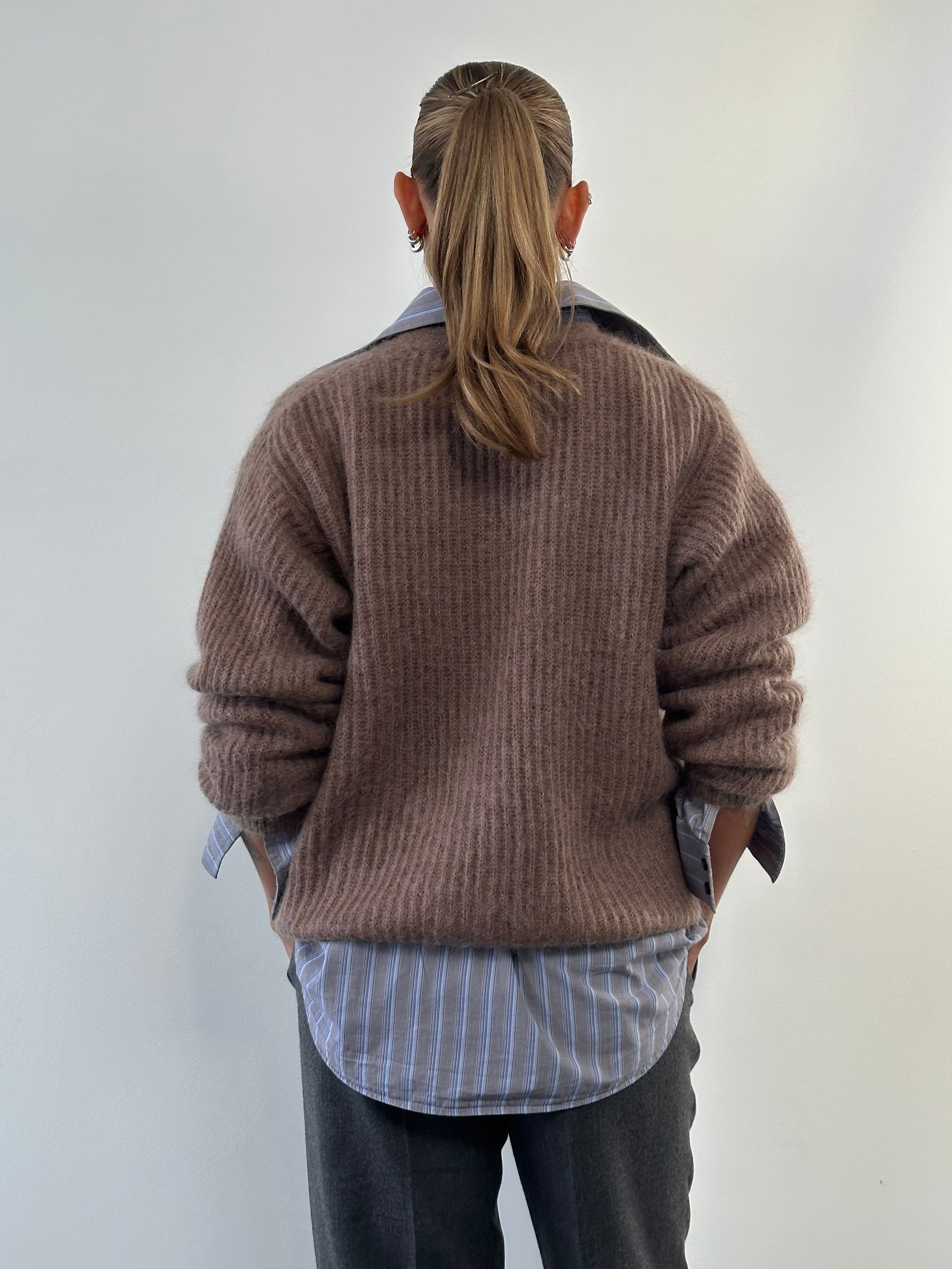 Vintage Italian fuzzy mohair cardigan in size large, soft and cozy with a textured knit, displayed on a neutral background.